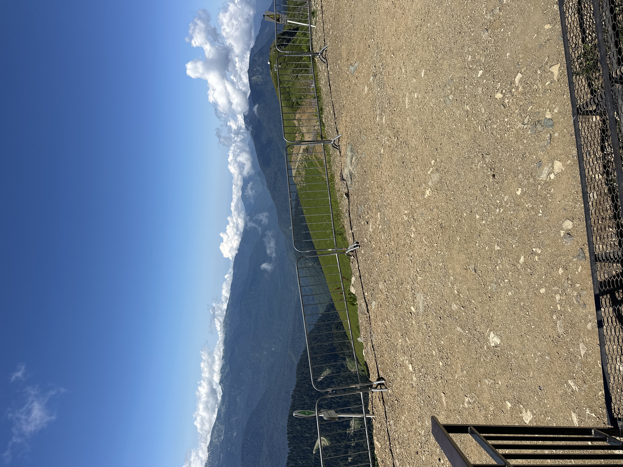 Crossing a mountain suspension bridge in Estosadok, Russia