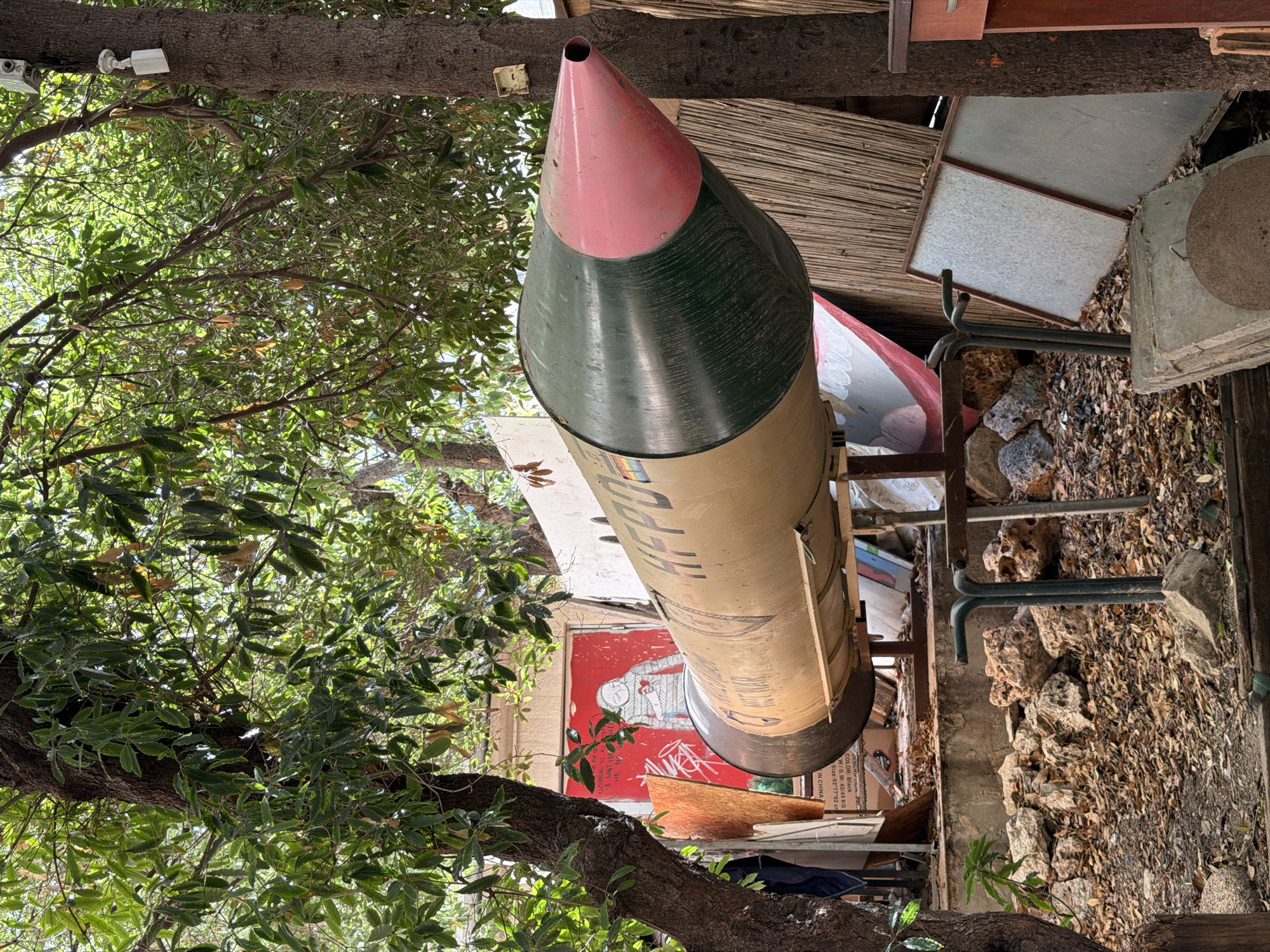 Haifa street-level scenes: missile display, playground, and subway station