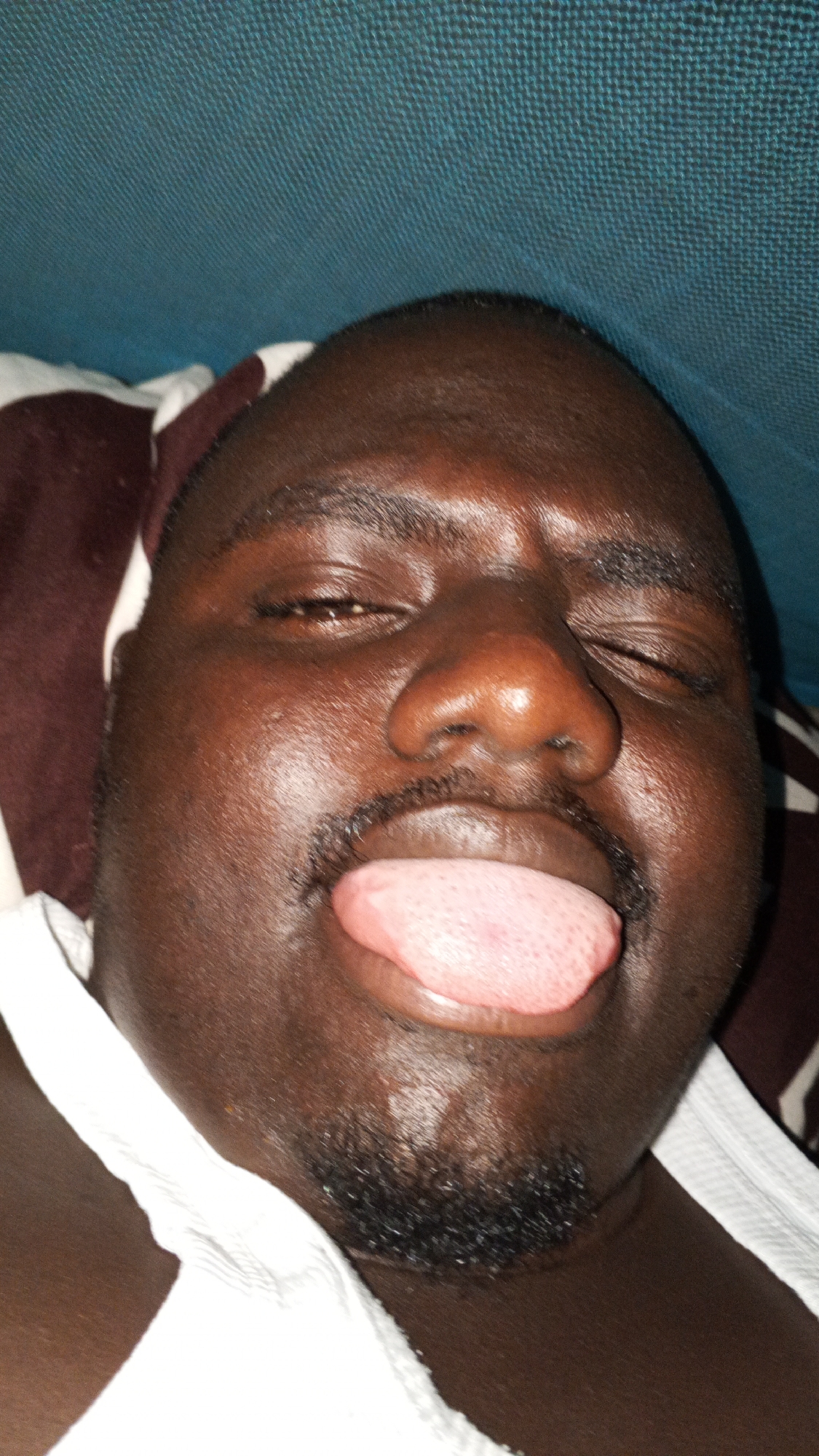 Man sleeping under mosquito net documented by witnesses