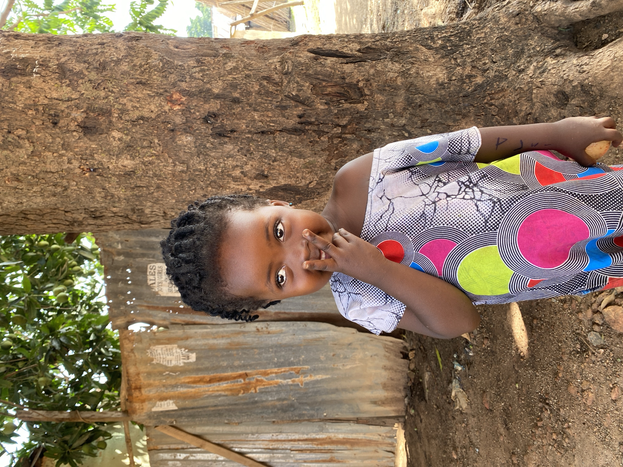 Child photographed in joyful portraits in Kuru Dungus, Nigeria