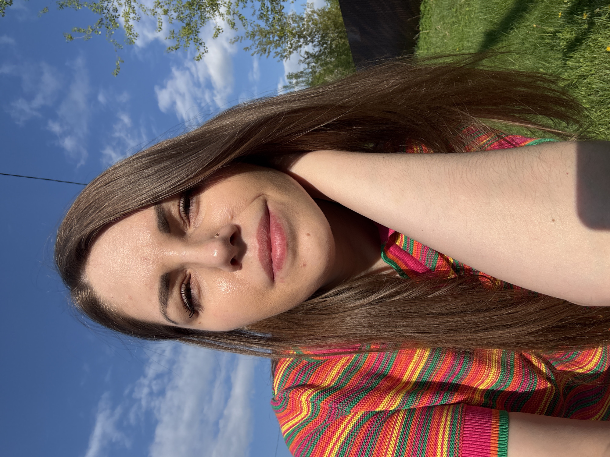 Woman documents springtime family moments in Russian village playground