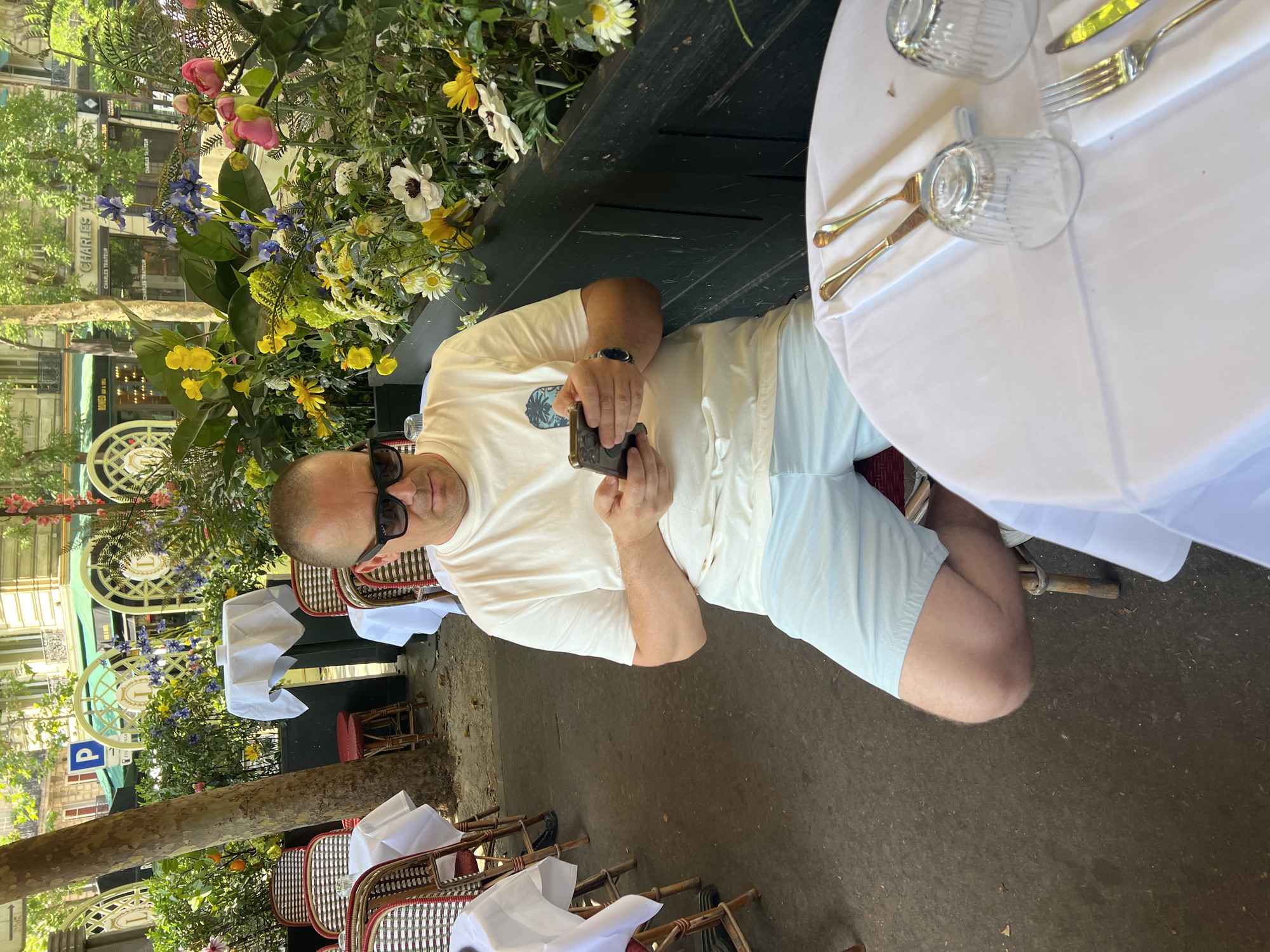 Café morning in Paris: drinks, croissants, and phones