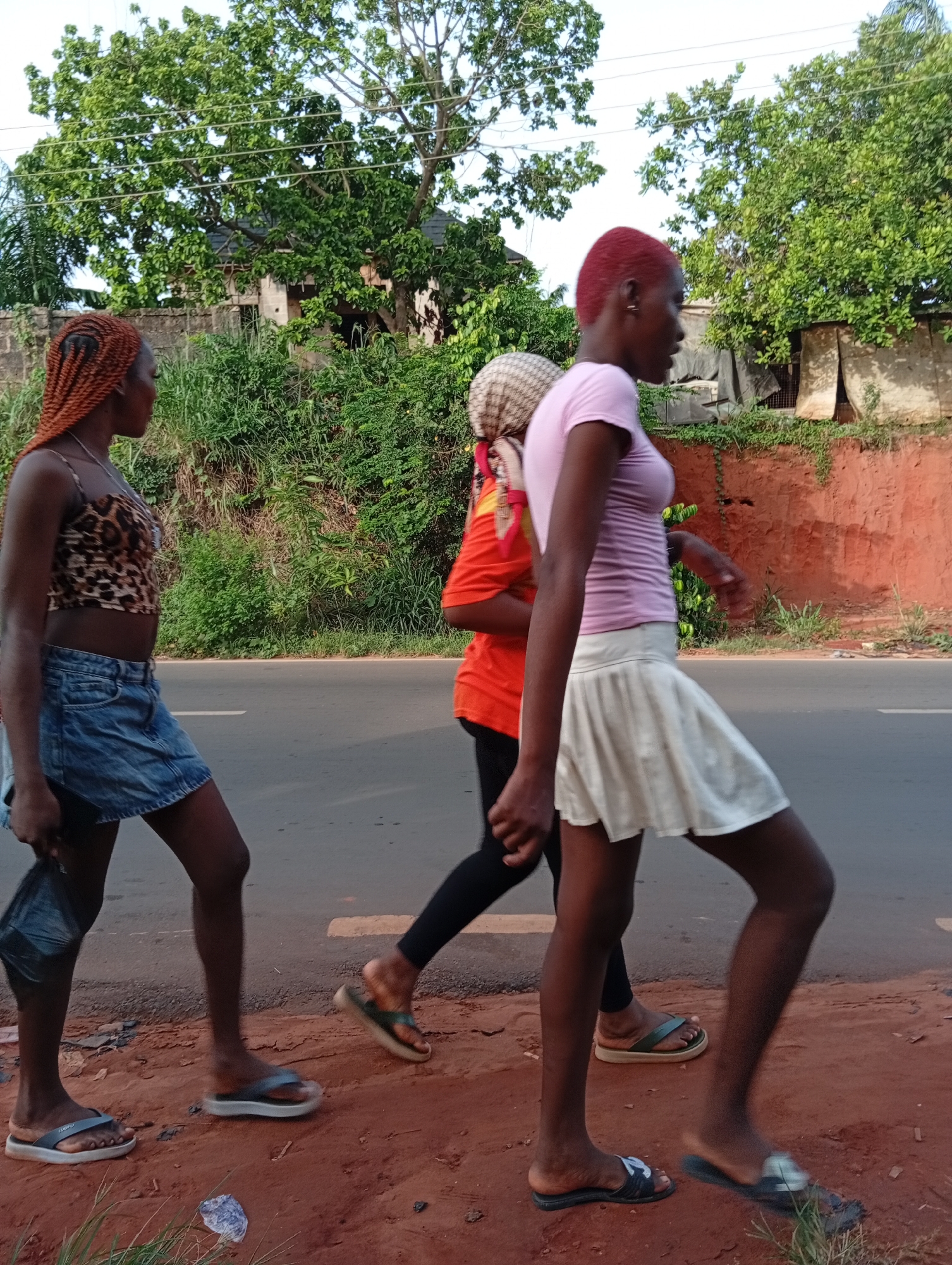 Daily life unfolds on Nkpor streets as residents navigate routine activities