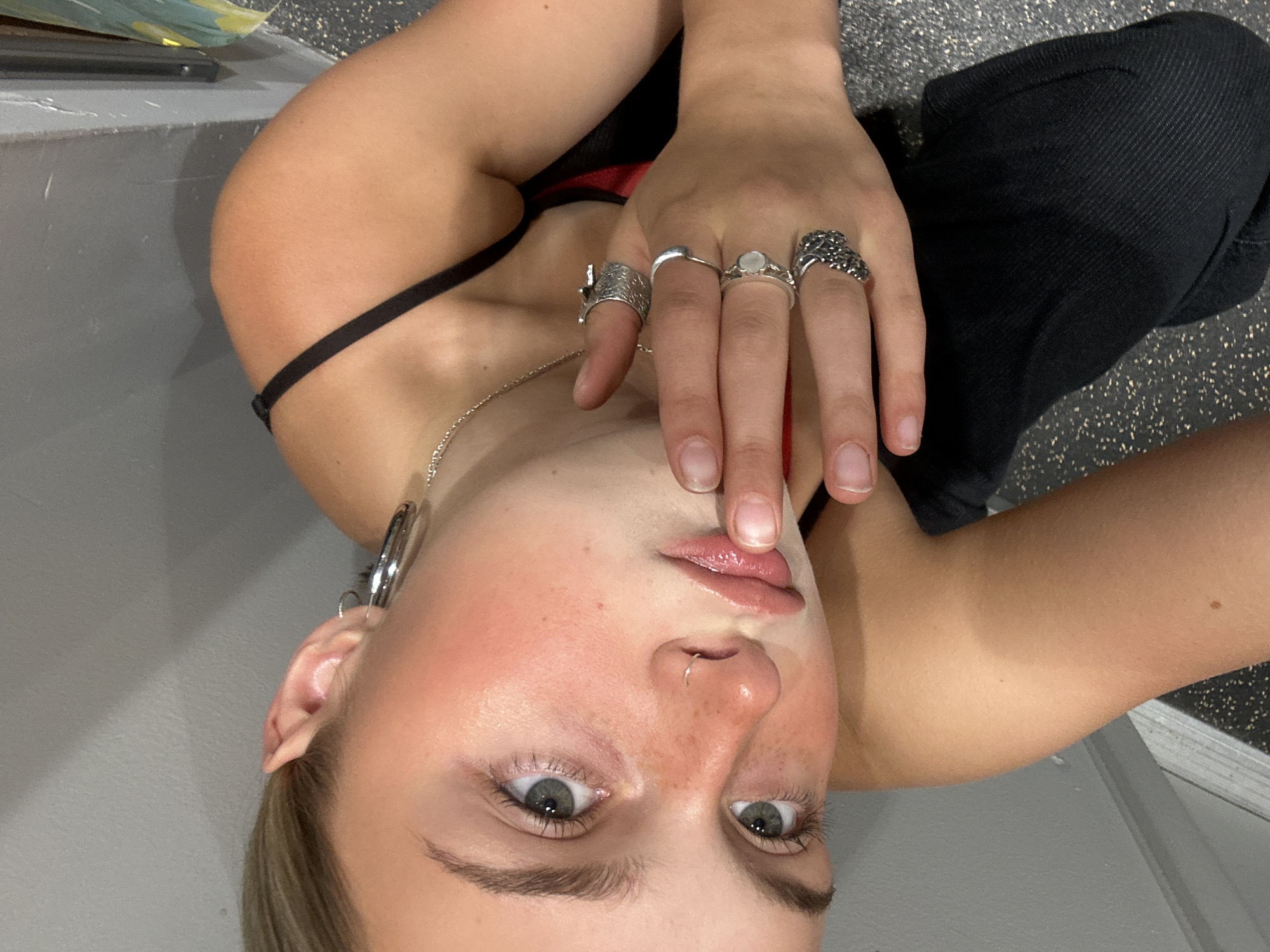 Young person takes selfies indoors in Whistler