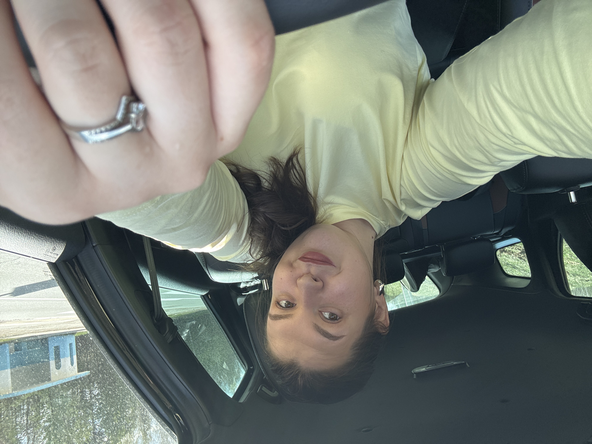 Woman takes selfie in car in Chaikovsky, Russia