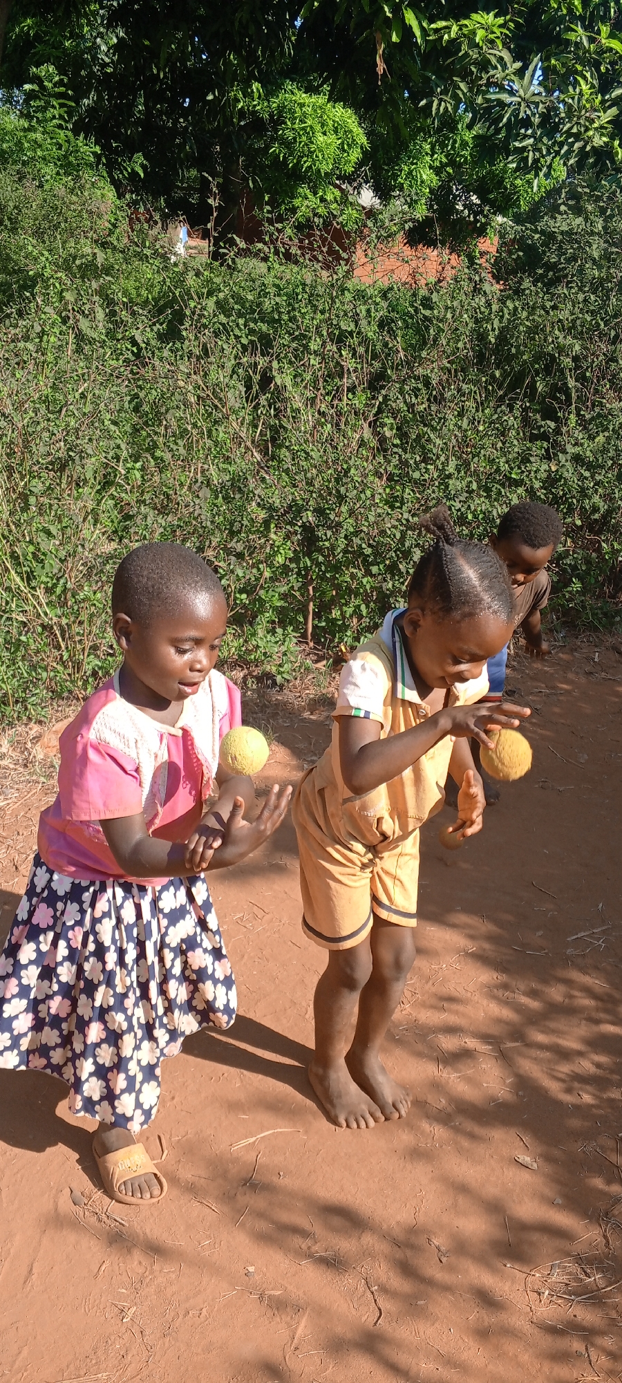 Children play traditional games and music in Ngalula, Congo