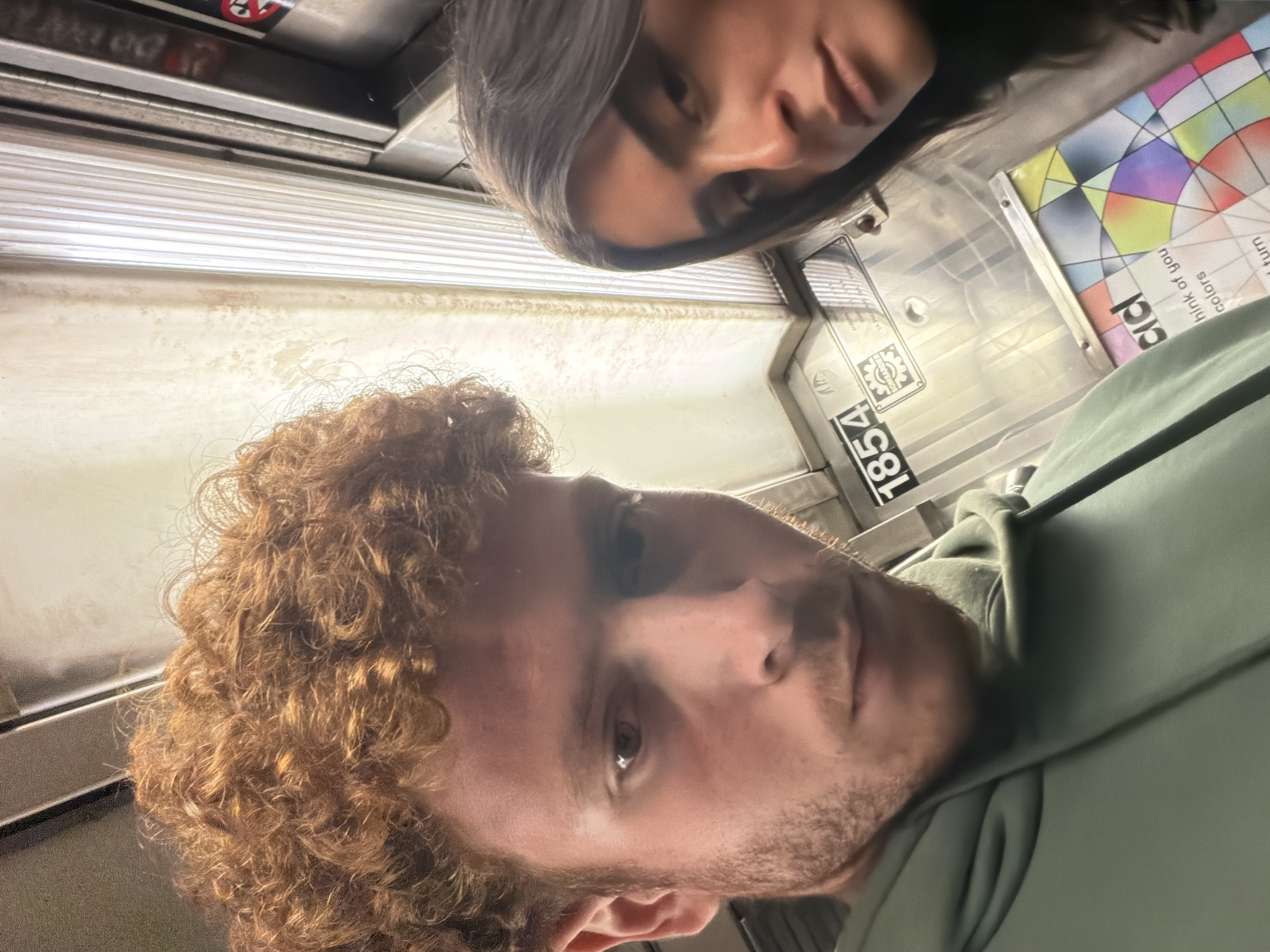 Couple spotted on NYC subway train in Manhattan