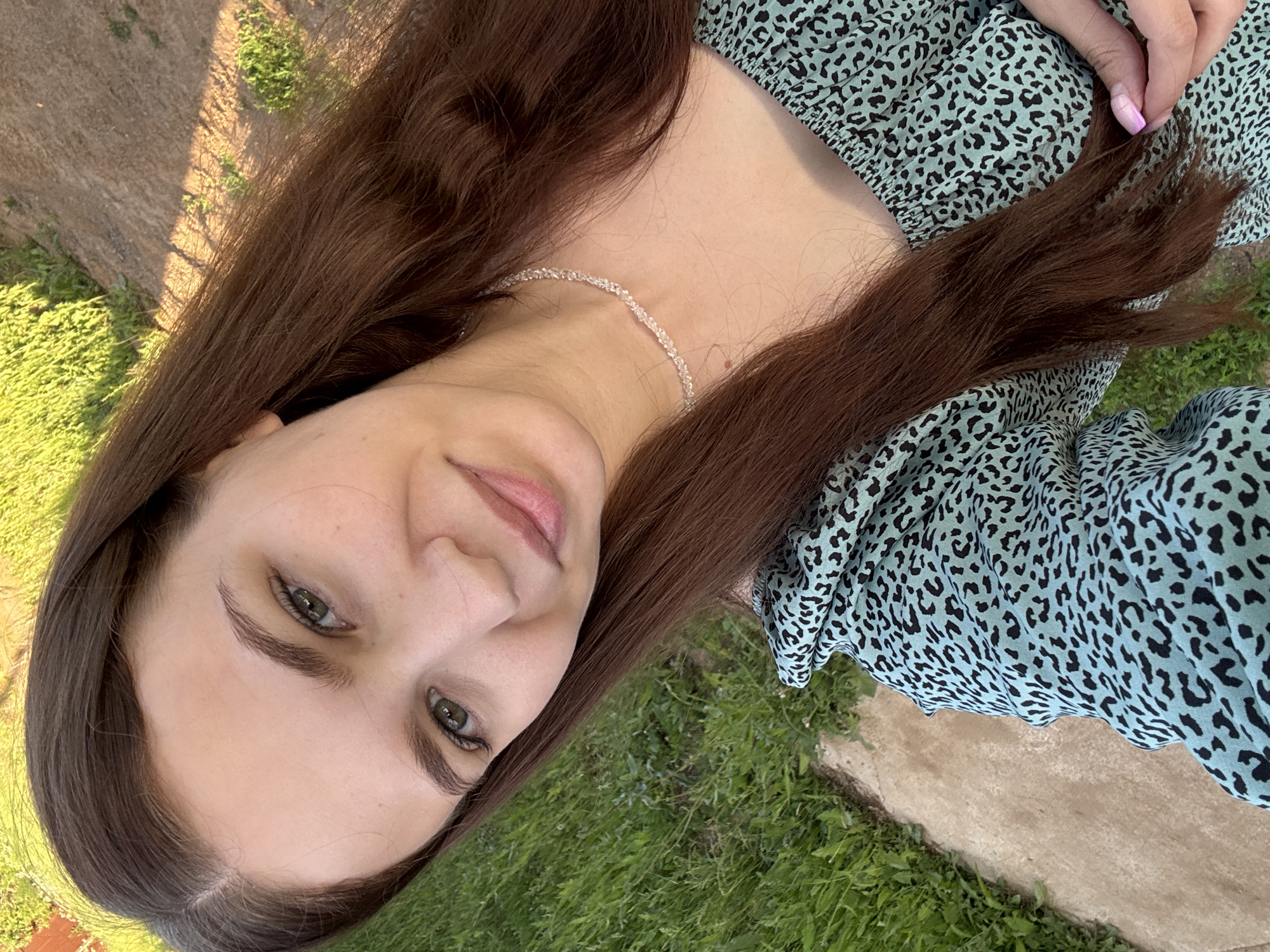 Woman documents afternoon outing with selfies and nature photography