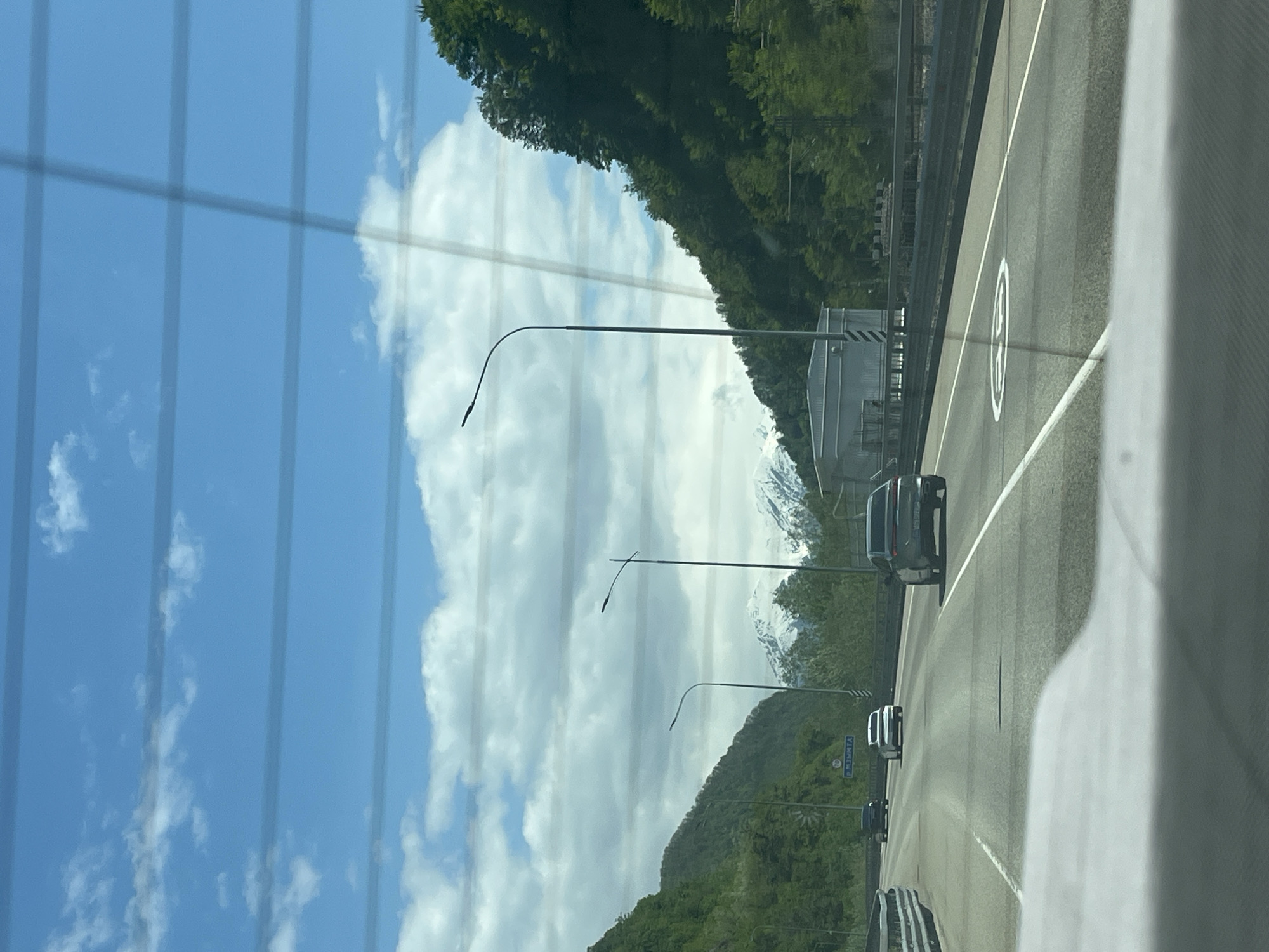 Traveler documents scenic mountain journey across multiple vehicles