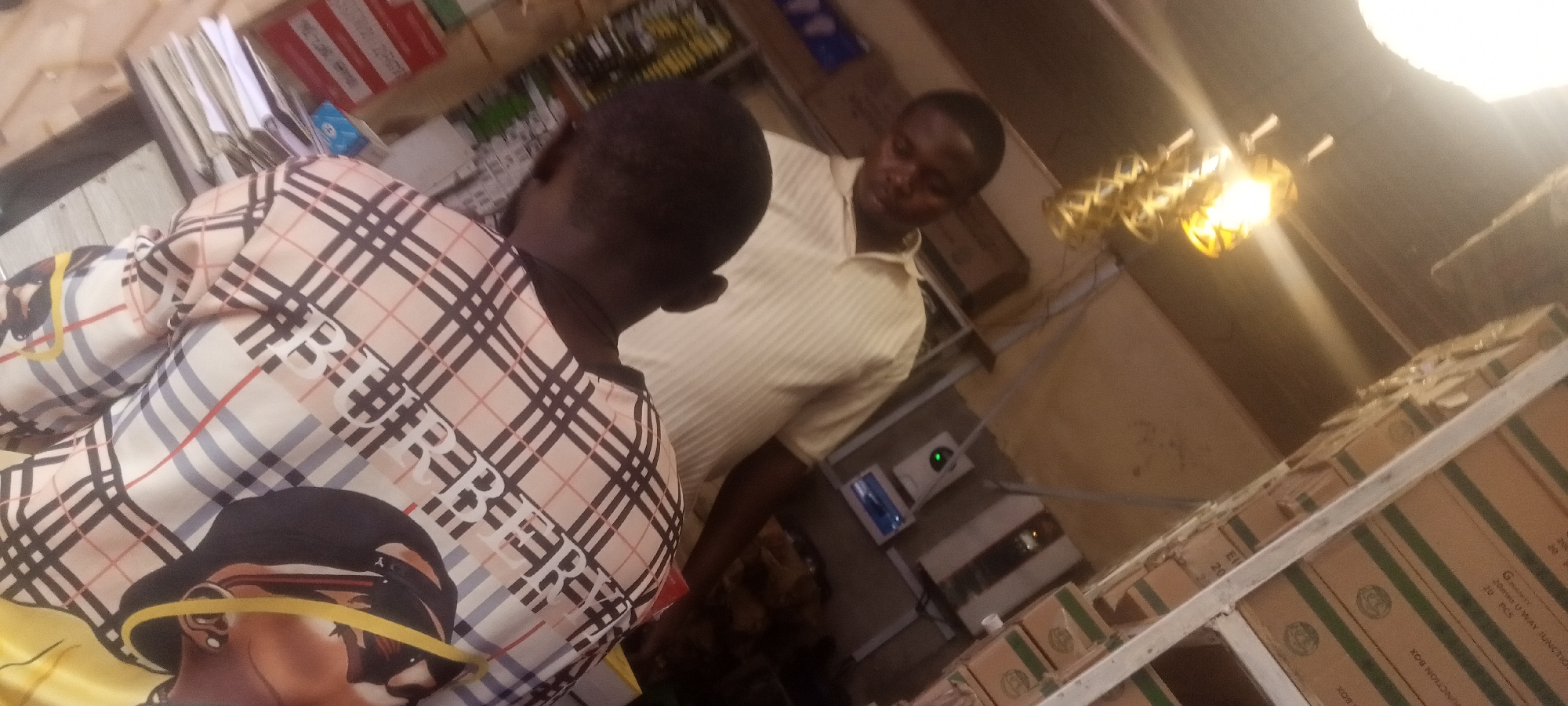 Morning business activity documented at Shaba Nigeria marketplace shops
