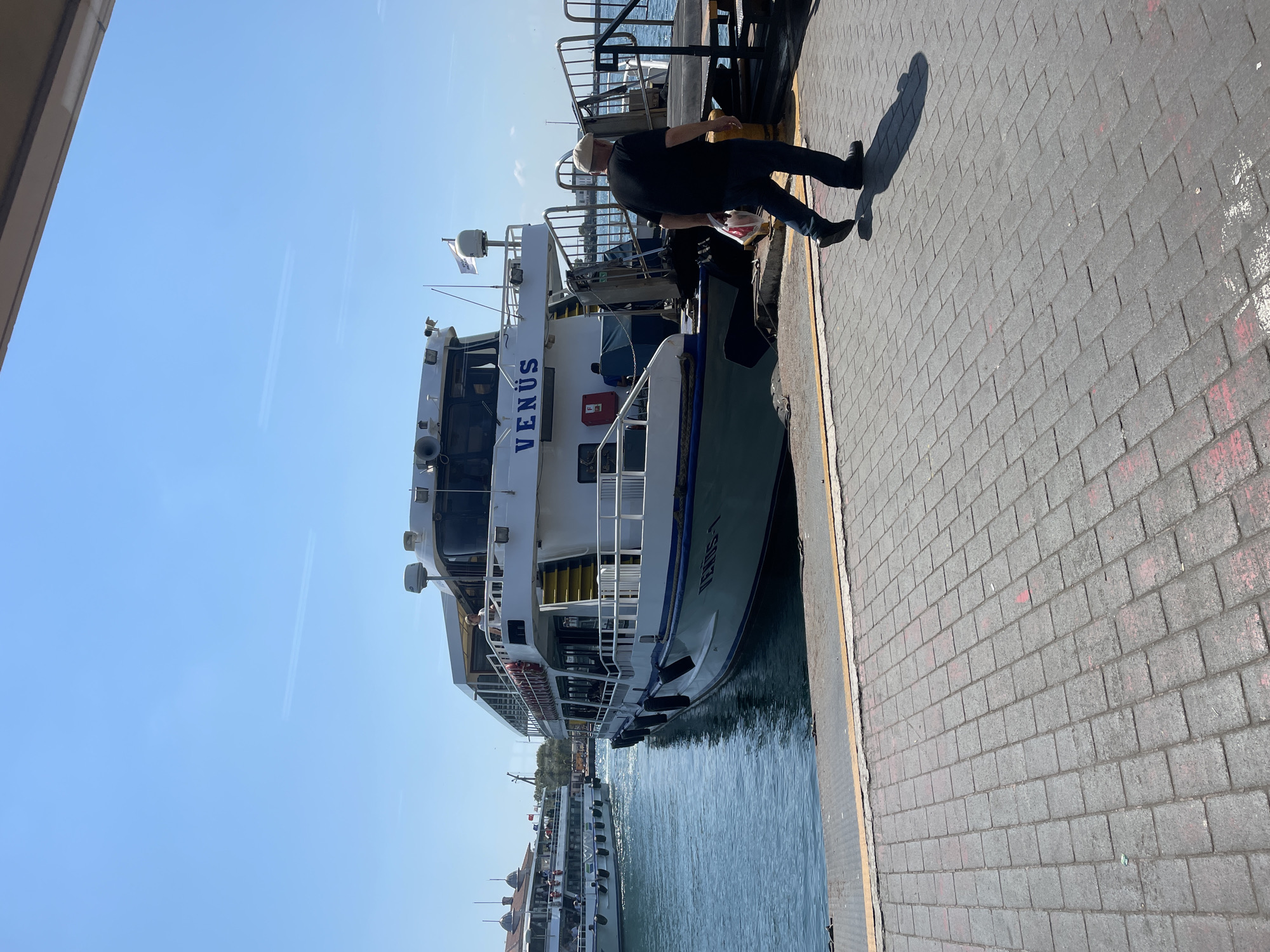 Kadıköy waterfront: ferries docked, construction crews at work