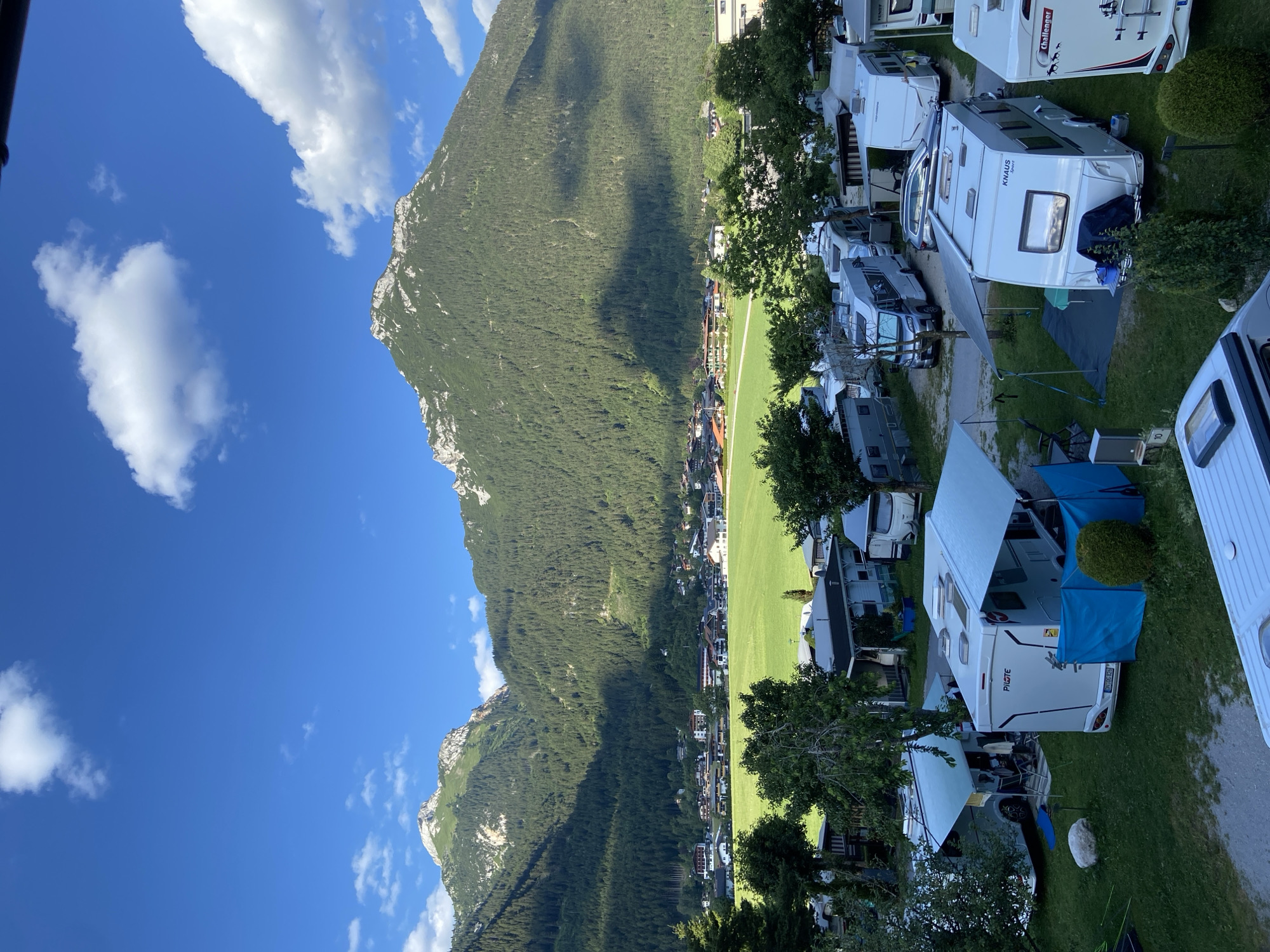 Alpine campsite at Lärchenwiese under clear summer skies