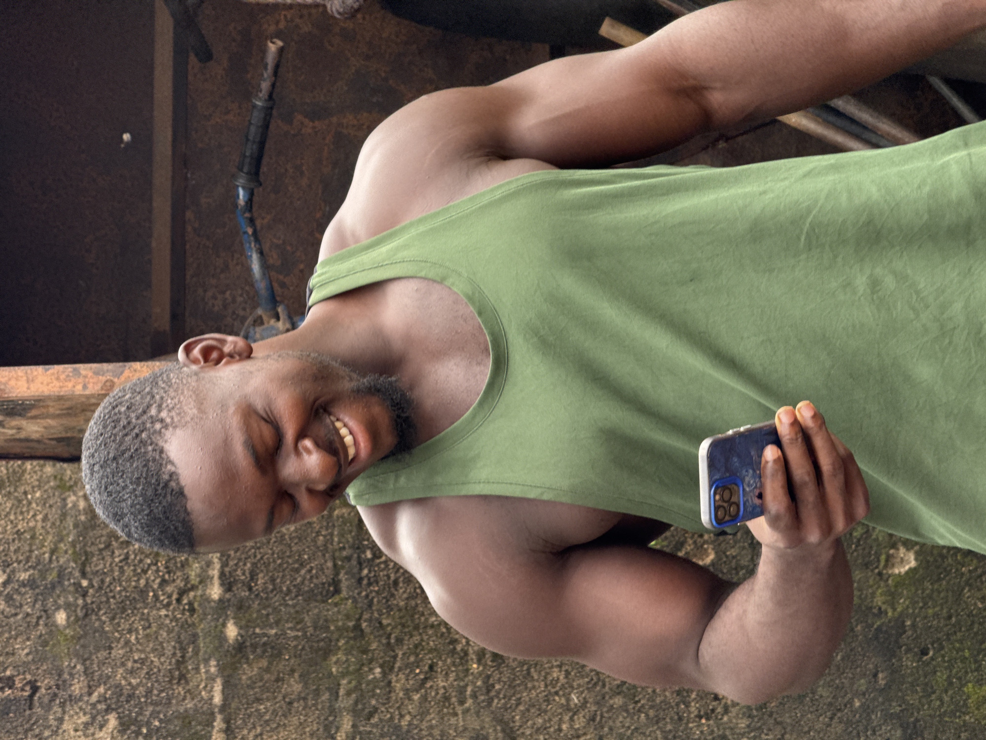 Outdoor gym session at a rustic Akwanga compound