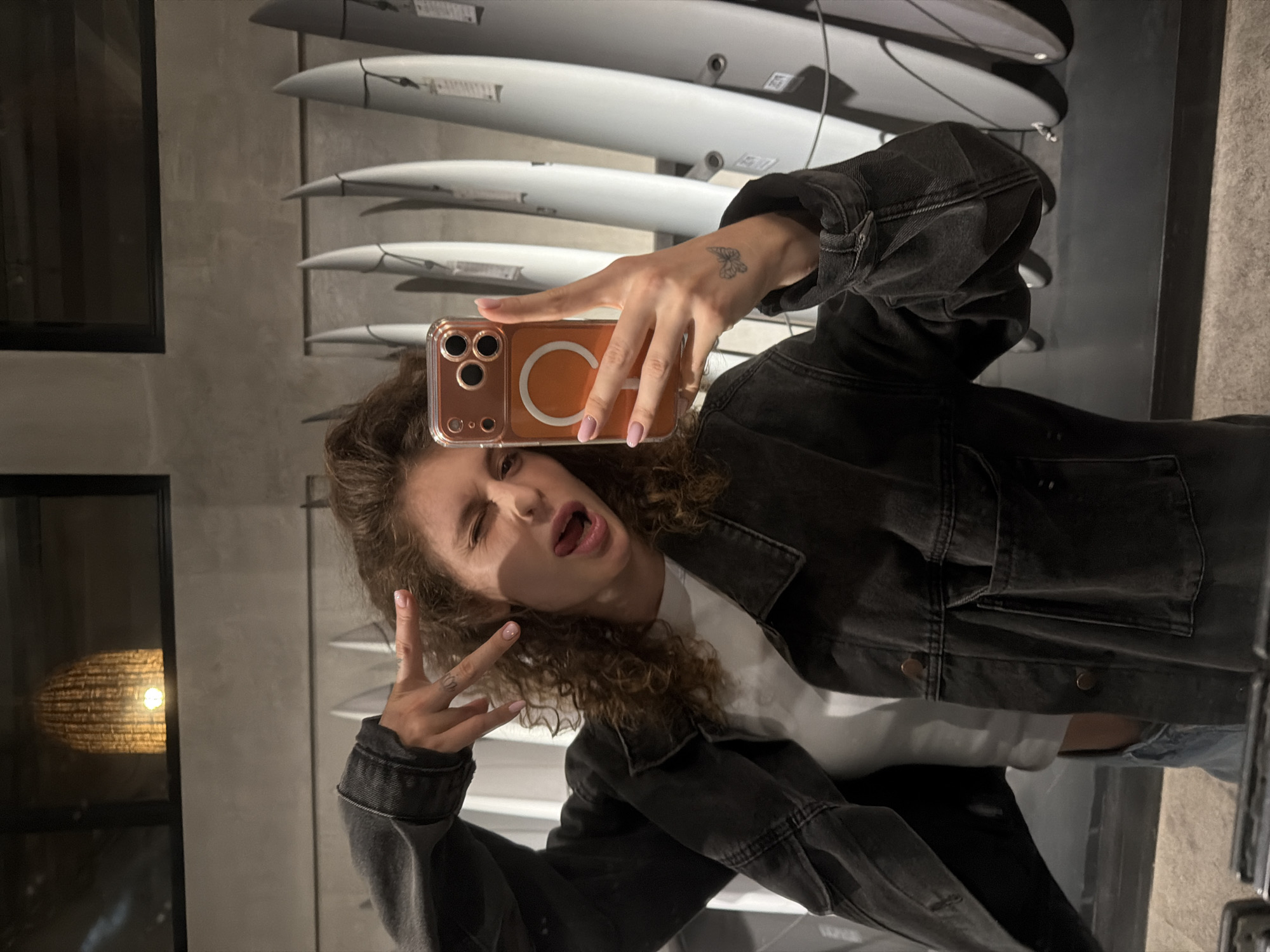 Mirror selfies inside a North Kuta surf shop