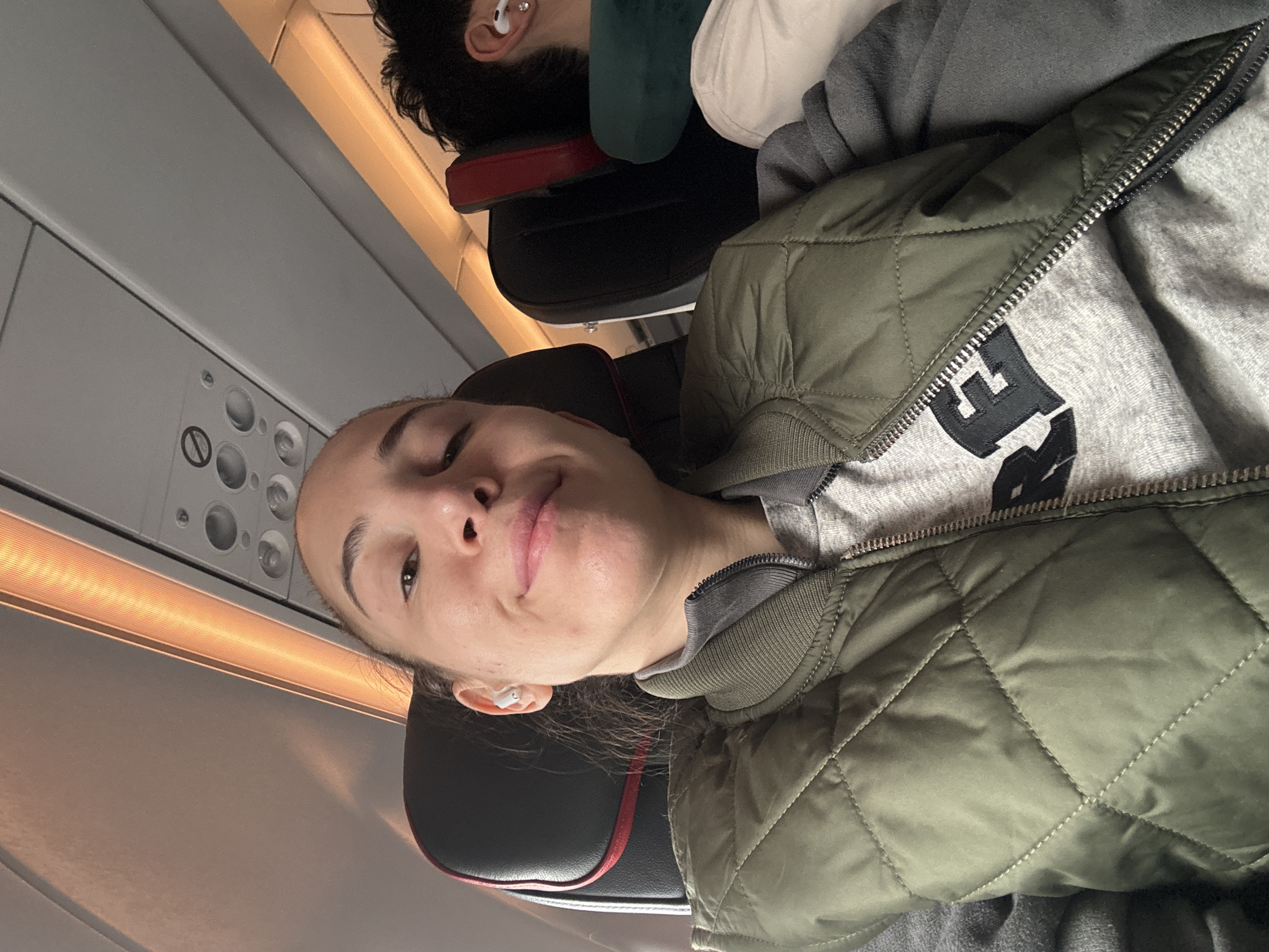 Woman in quilted jacket observed on flight near Istanbul