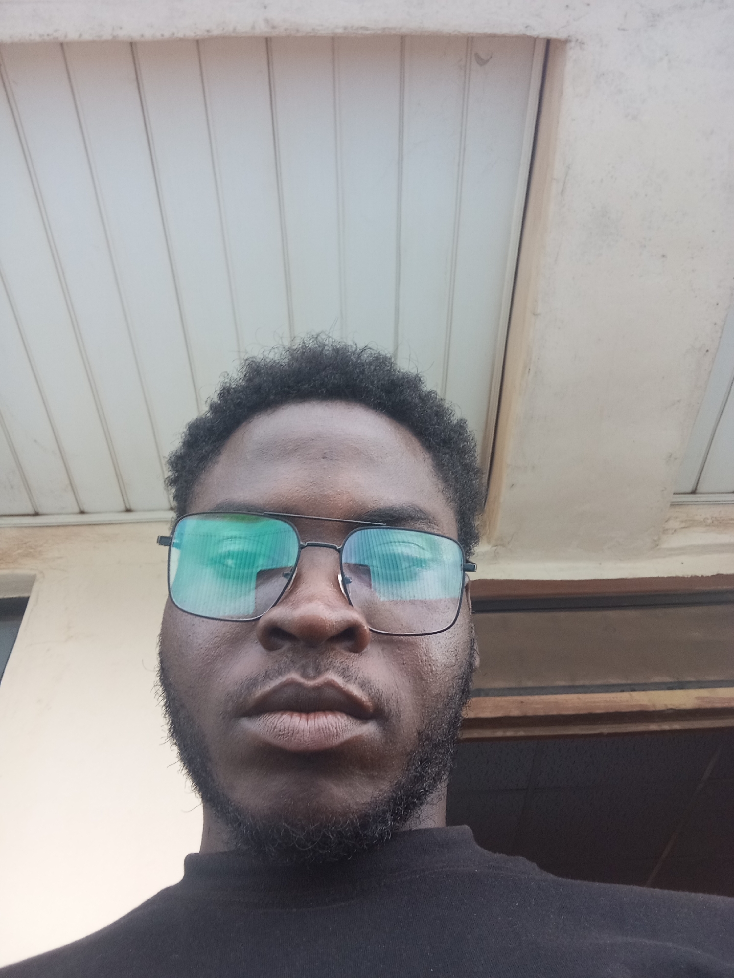 Rooftop selfies and busy street views in a Nigerian city