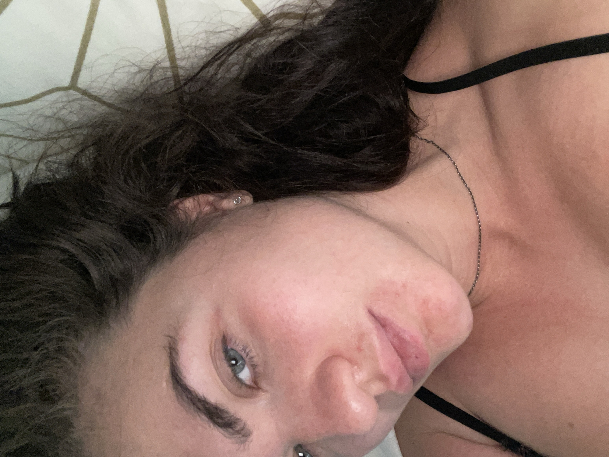 Close-up overhead shots of someone resting in bed, Moscow region
