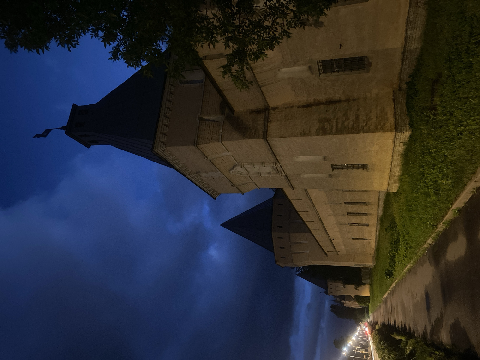 Novodevichye Monastery glows under a deep blue evening sky.