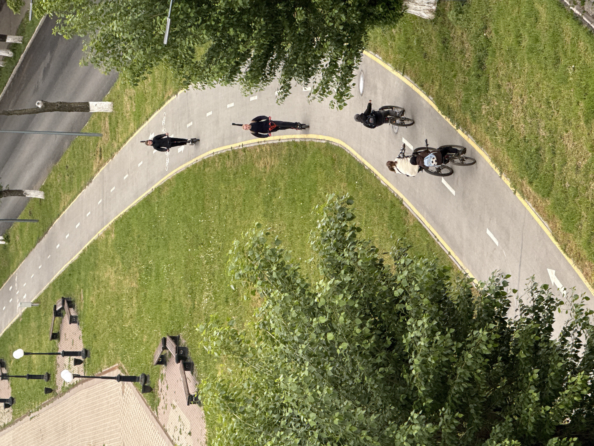 Early morning cyclists and scooter riders use Votkinsk pathway