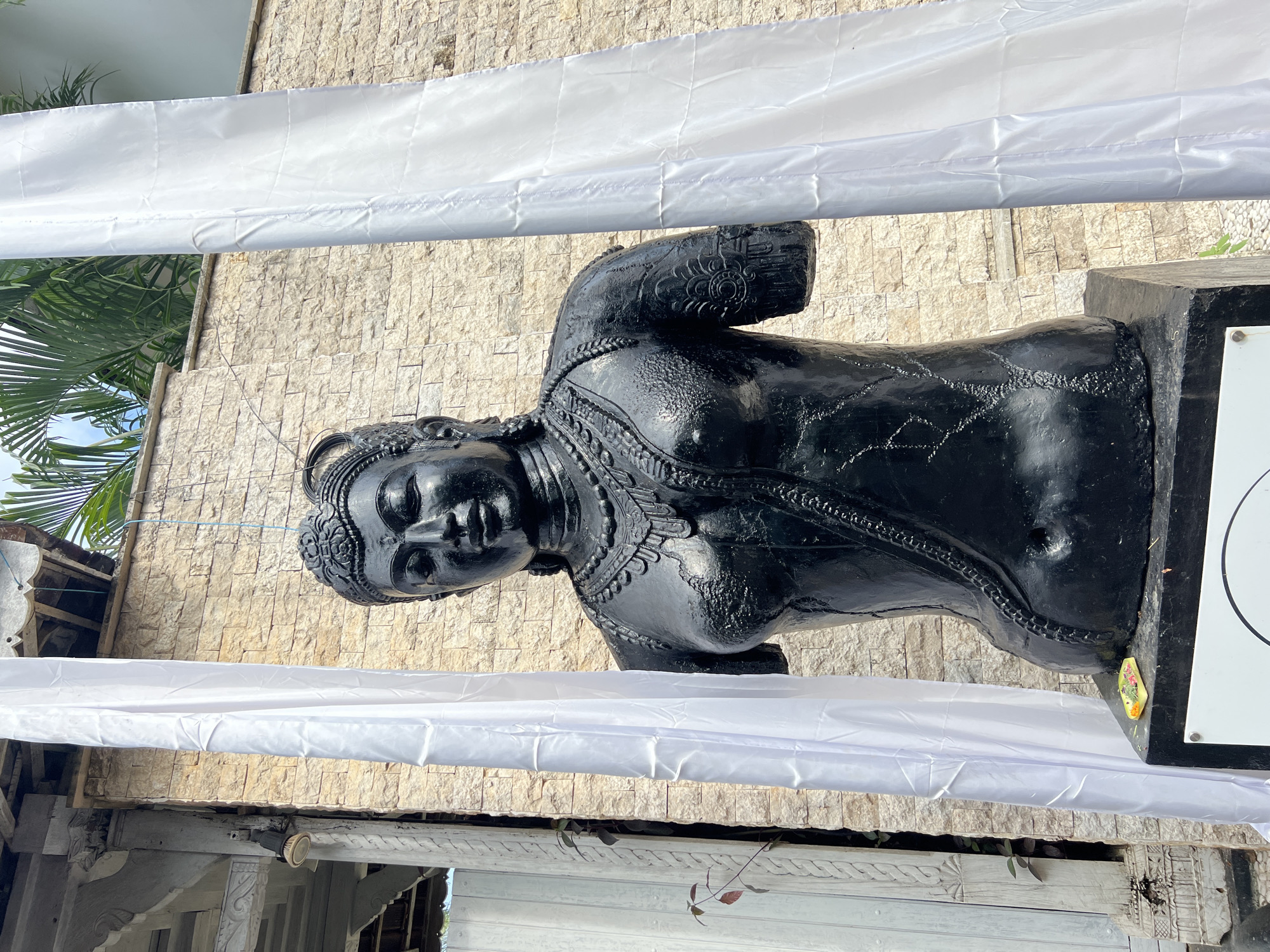 Witness documents statues and ocean views in Pecatu, Indonesia