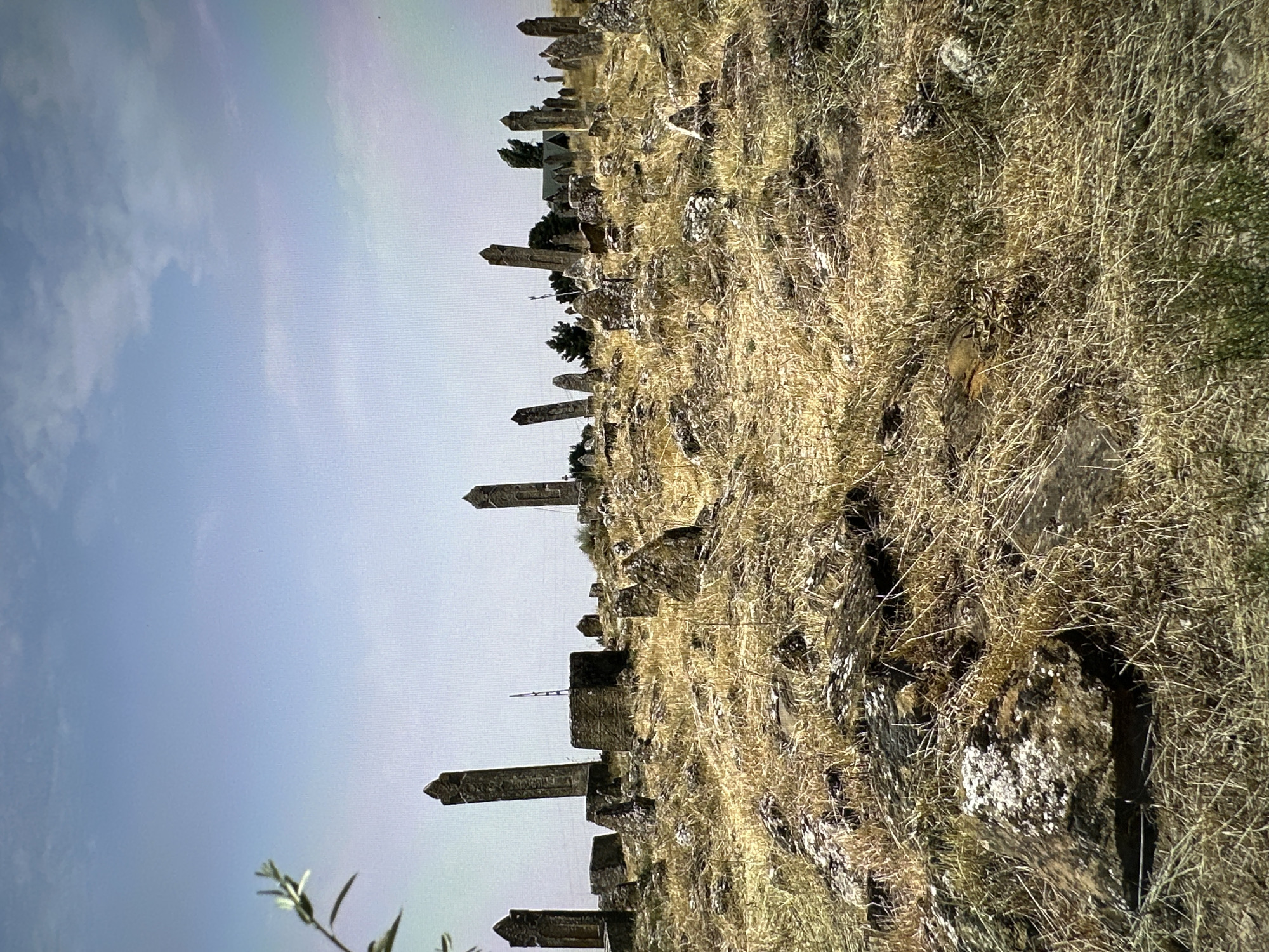 Gobustan's arid hills, ancient graves, and open road