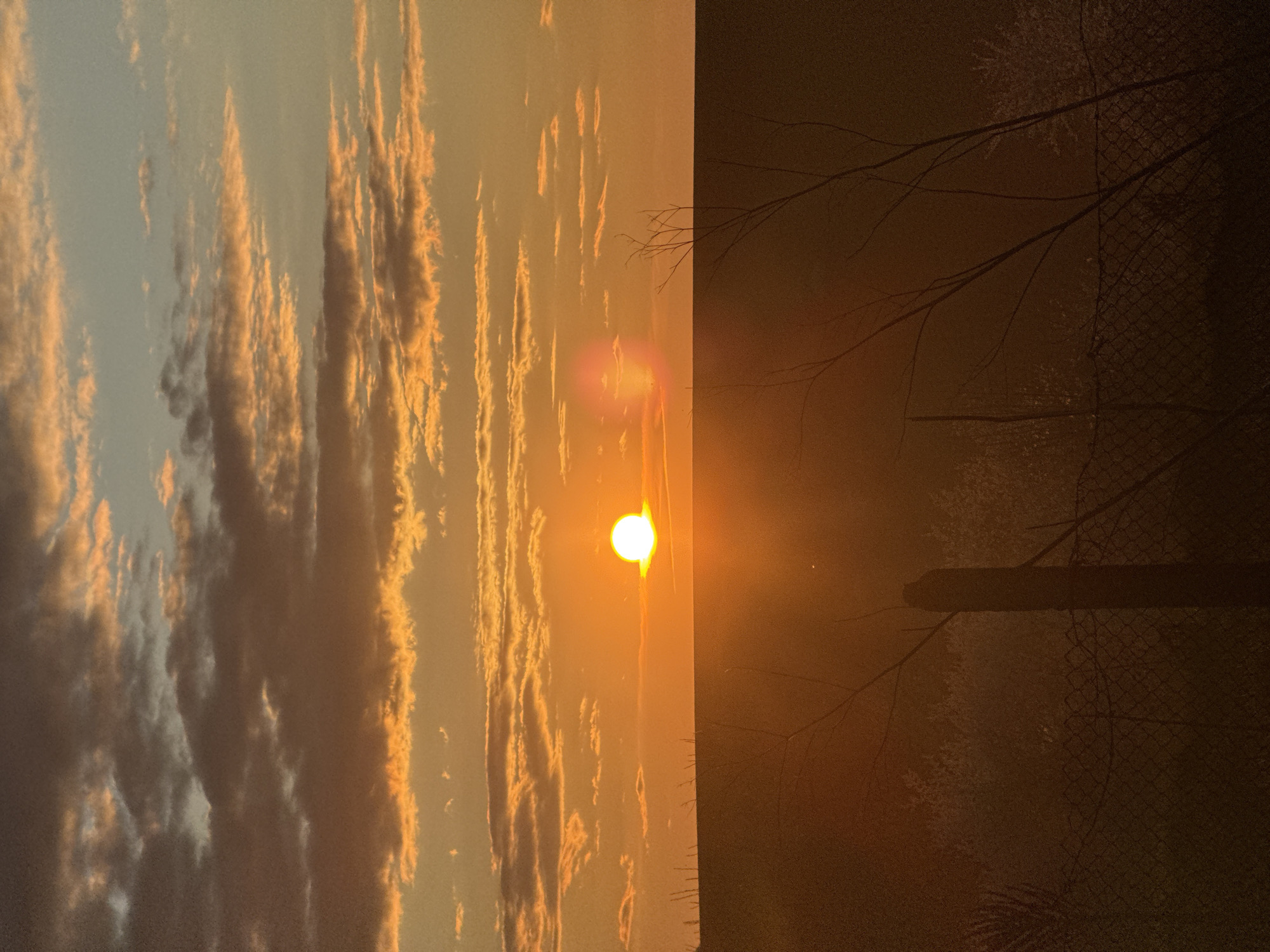 Sunset observed through layered clouds in Zornitsa, Bulgaria