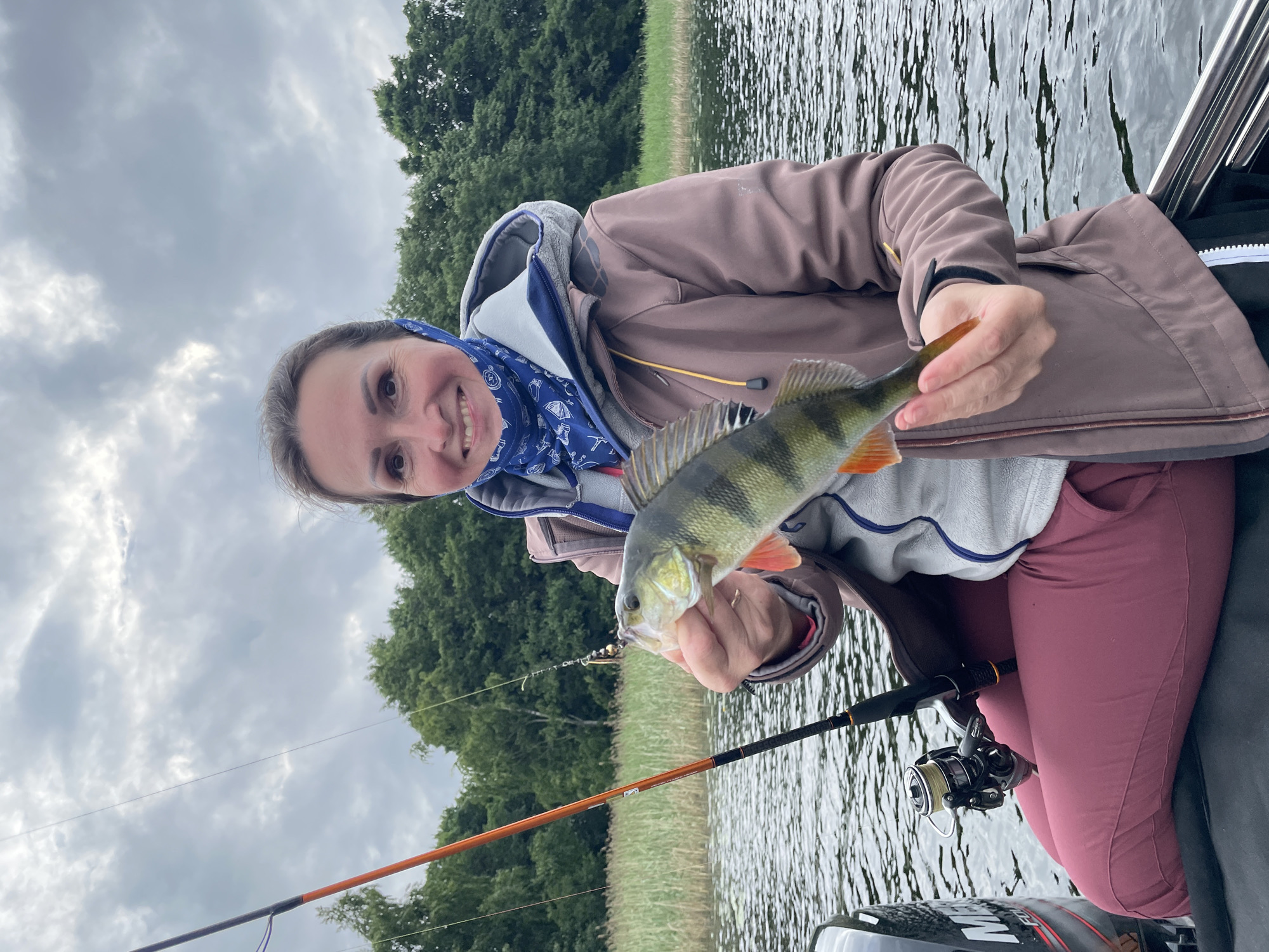 Fresh catch on a Russian lake, summer afternoon fishing