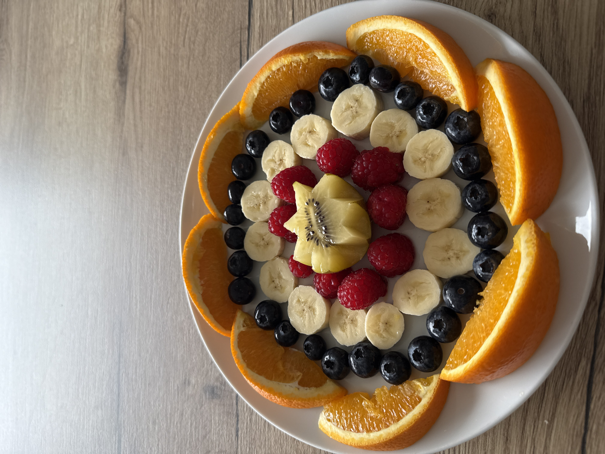 Fresh fruit arrangements photographed on wooden table in Luxembourg