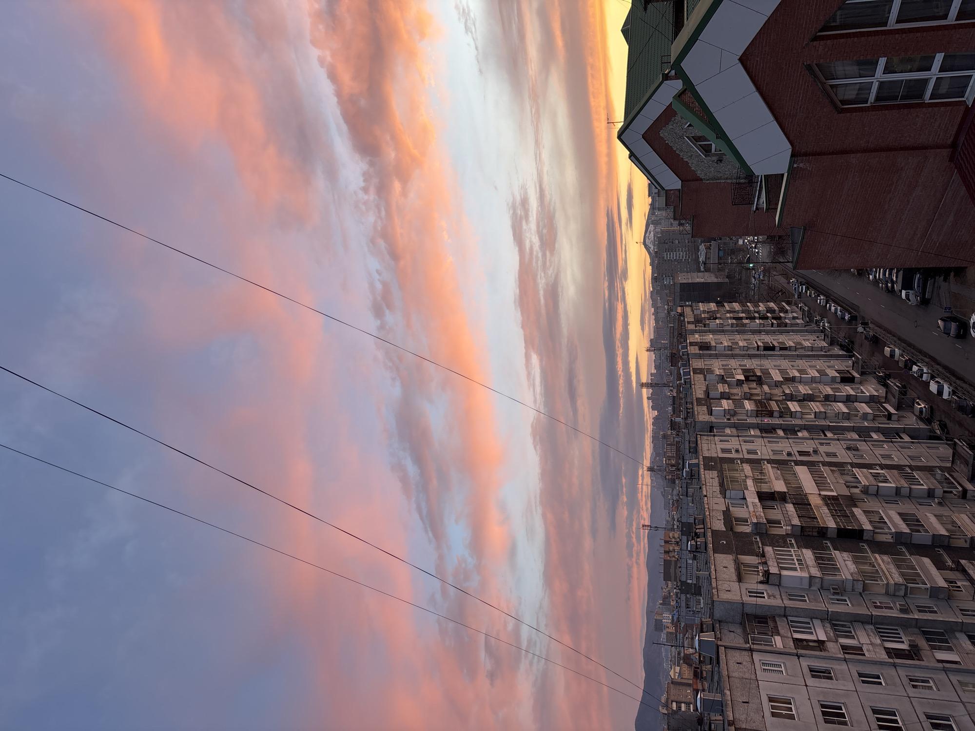 Dramatic sunset captivates multiple observers across Krasnoyarsk, Russia