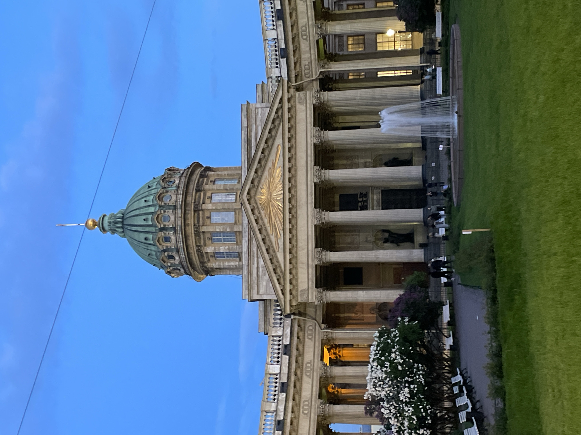 Tourist documents evening stroll near Kazan Cathedral in Saint Petersburg