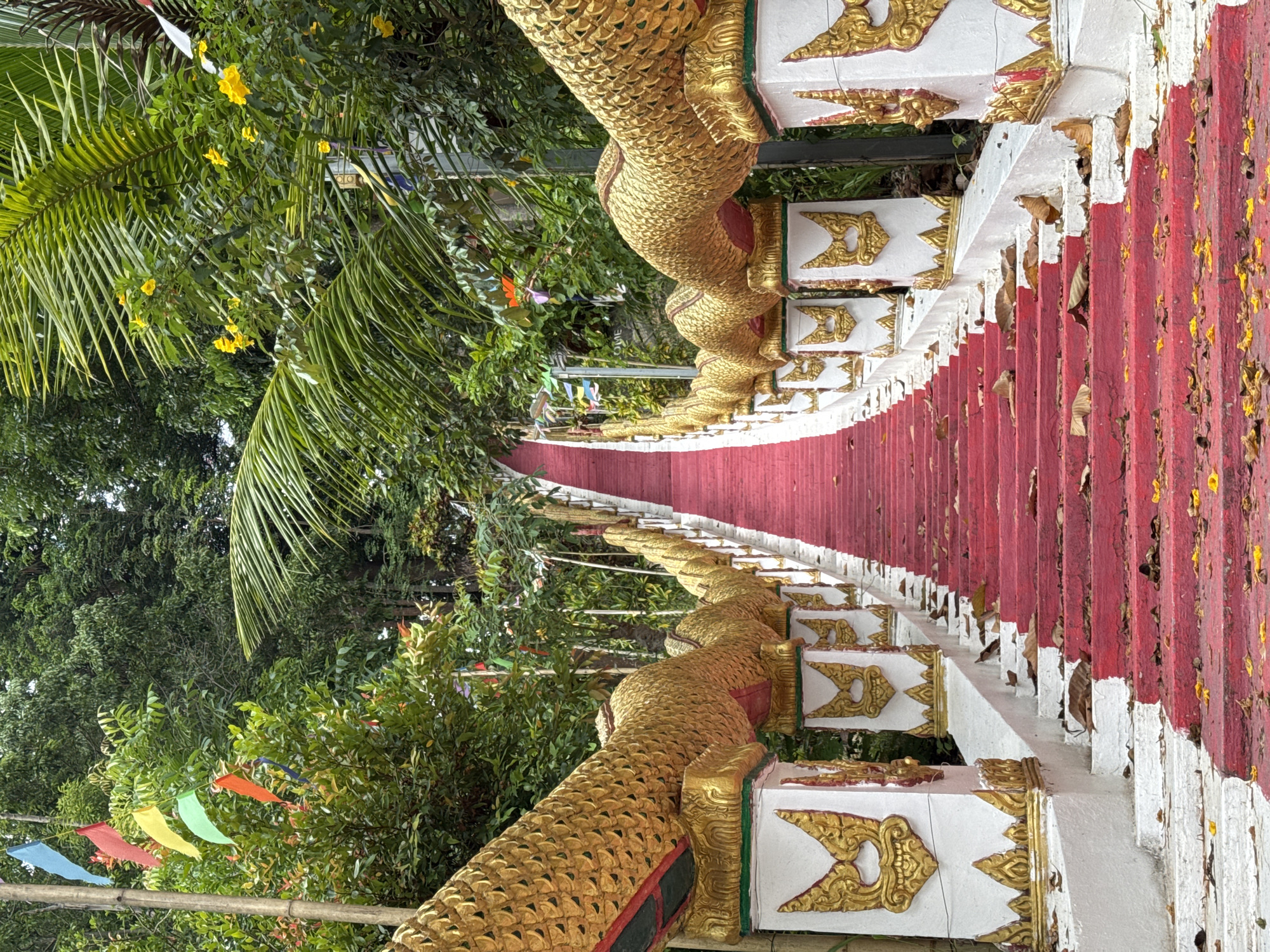 Naga-flanked temple staircase on Koh Phangan
