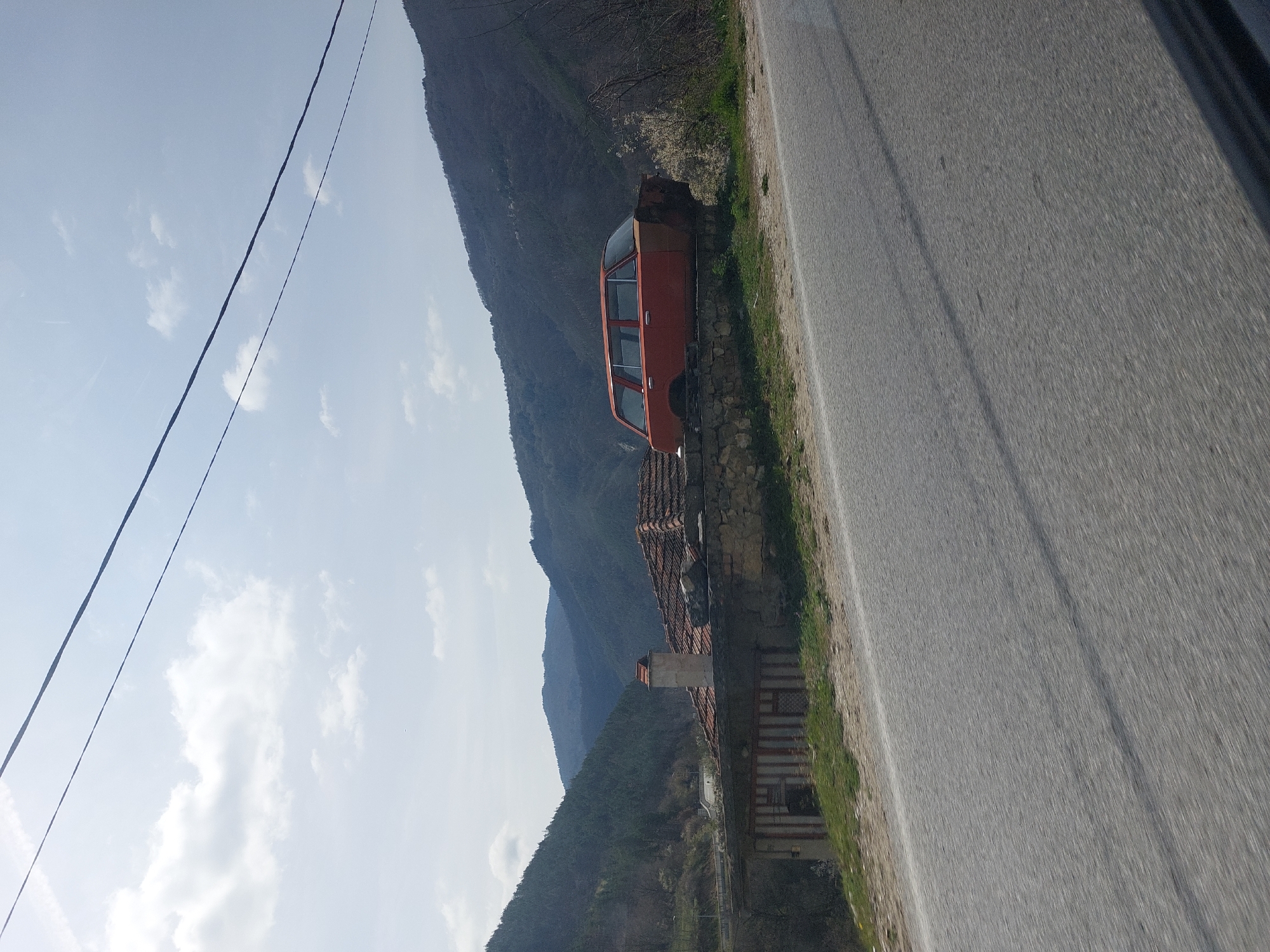 Vintage orange car spotted roadside in Mihalkovo, Bulgaria