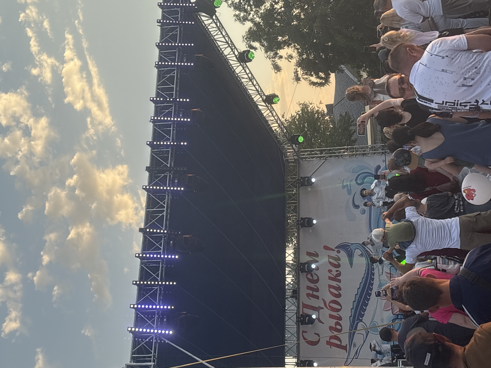 Fisherman's Day festival on Astrakhan's Volga embankment at sunset