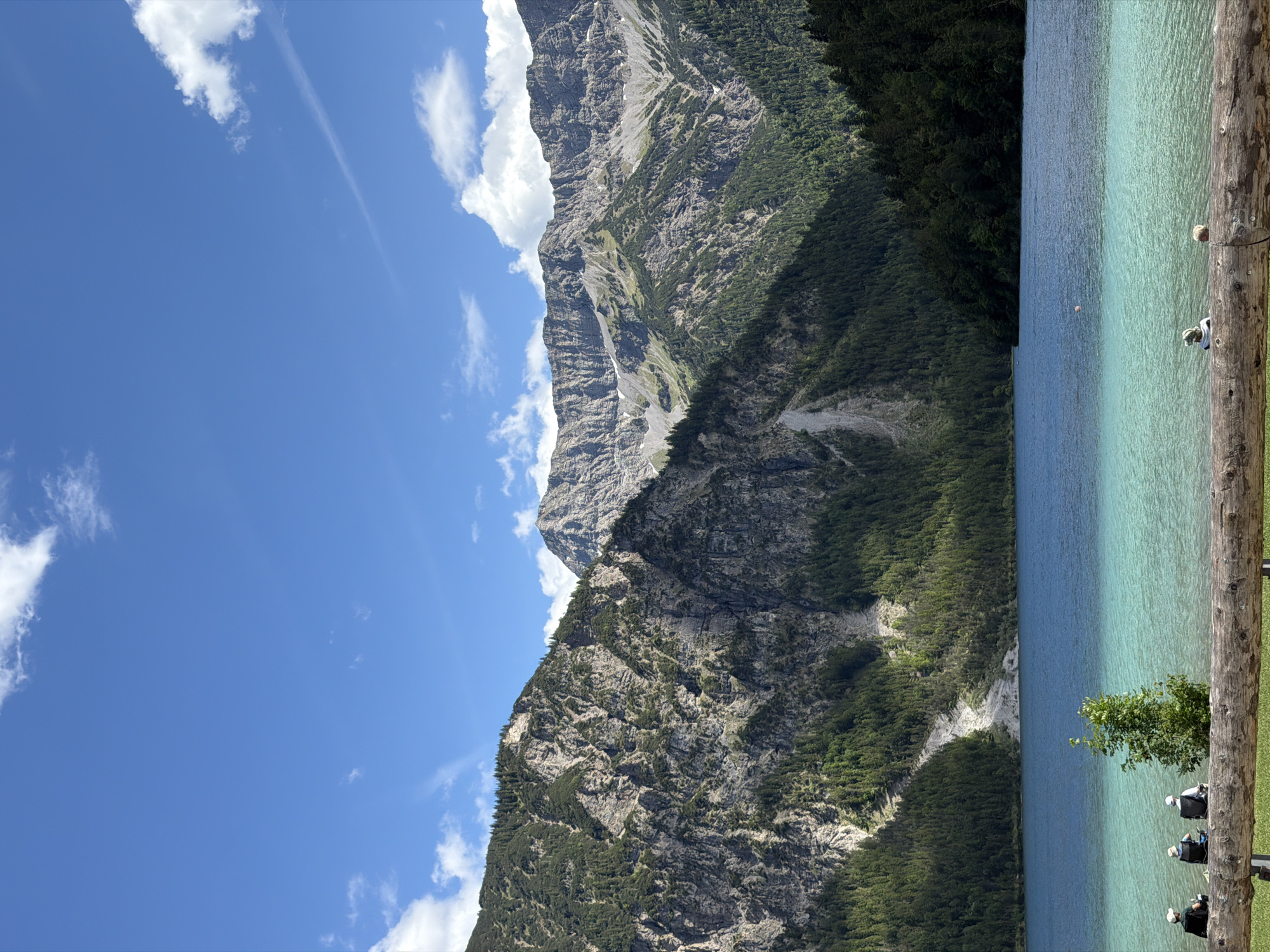 Plansee on a clear Alpine afternoon, boats and mountains
