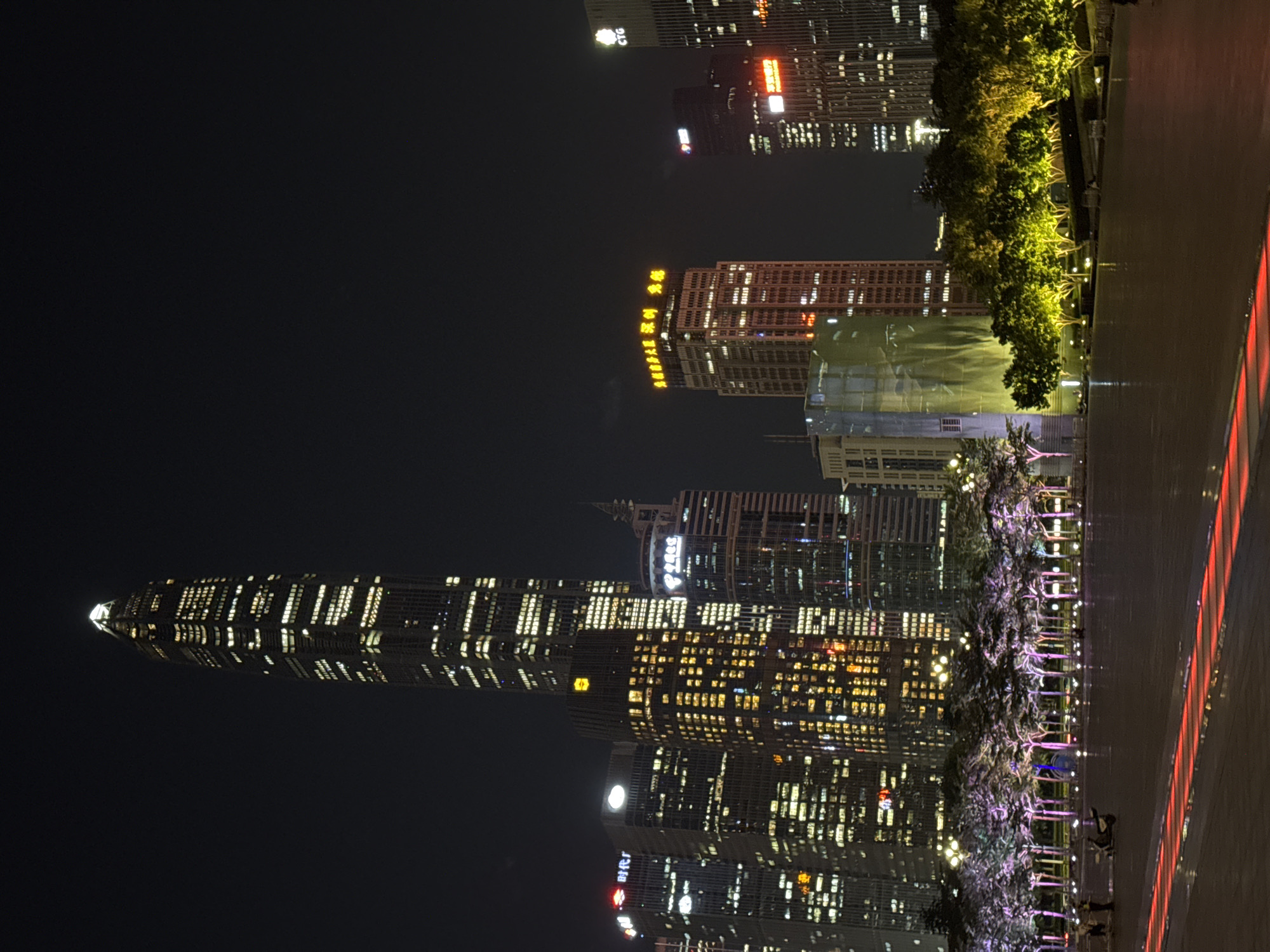Nighttime documentation of illuminated Futian District skyline in Shenzhen