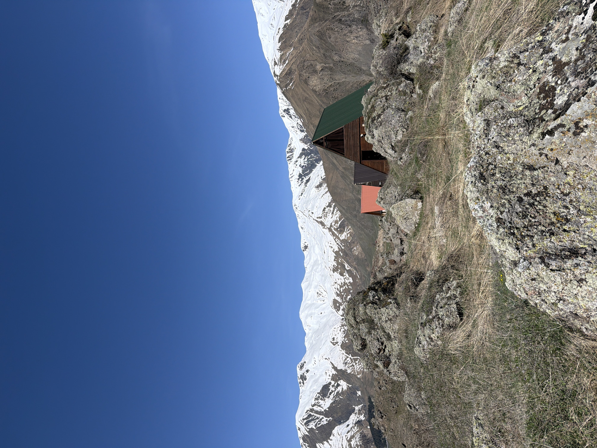 Mountain building complex observed in snowy Georgian landscape