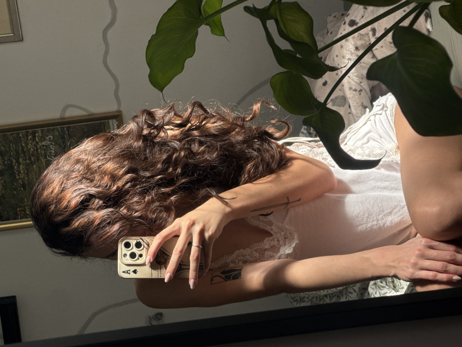 Mirror selfie captured in Tel-Aviv indoor setting