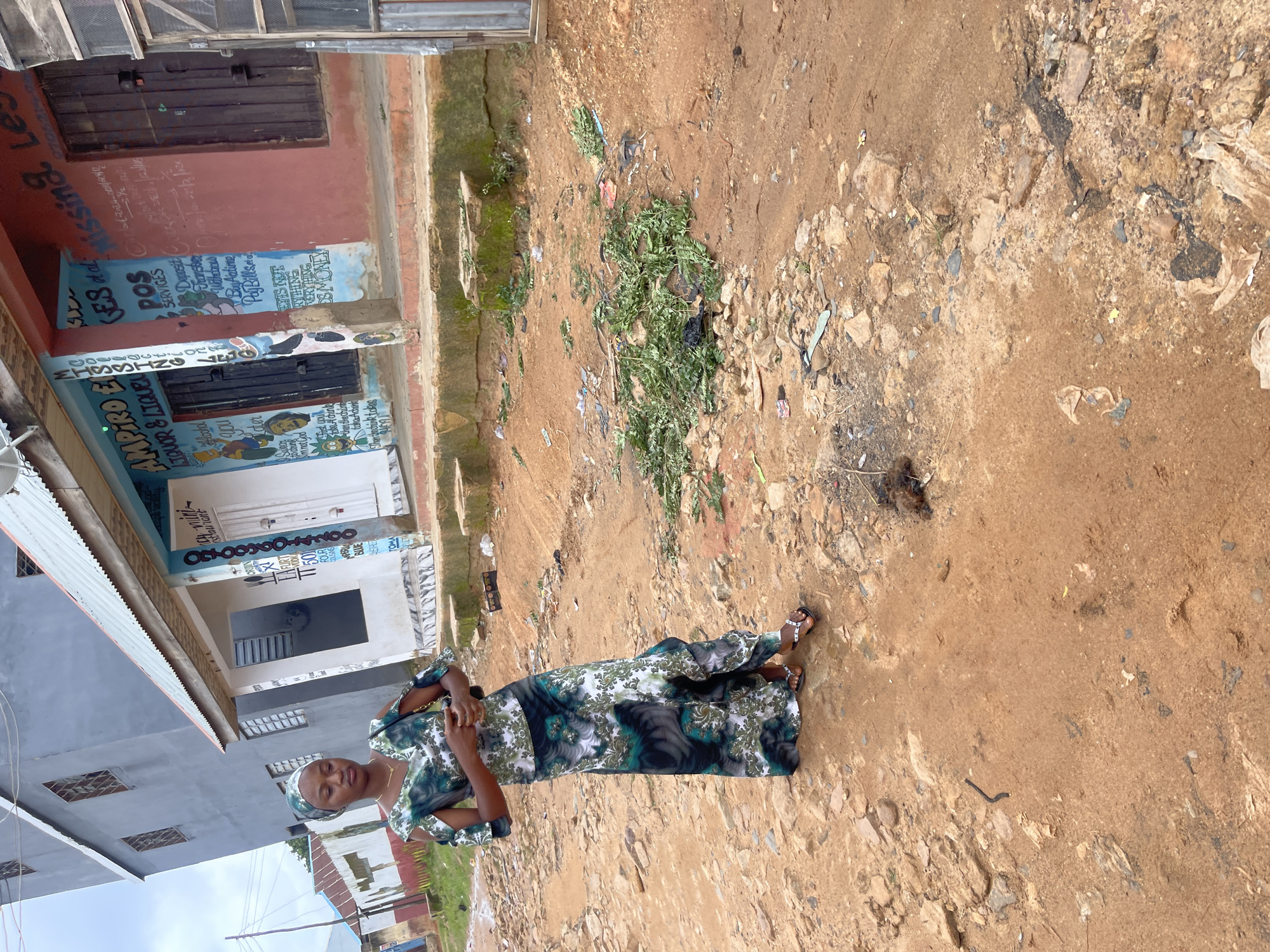 Street-level life on a dusty Jos morning, June 2026