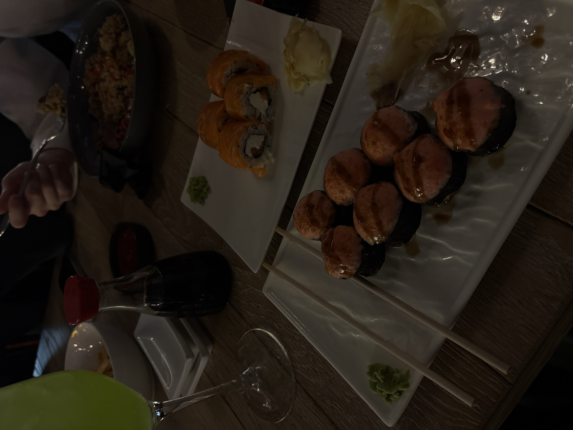 Dinner scene with sushi and rice documented in Russia