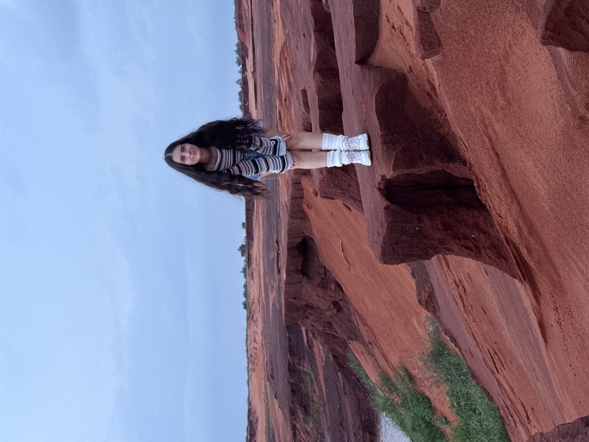 Woman poses for photos at Mui Ne Red Sand Dunes