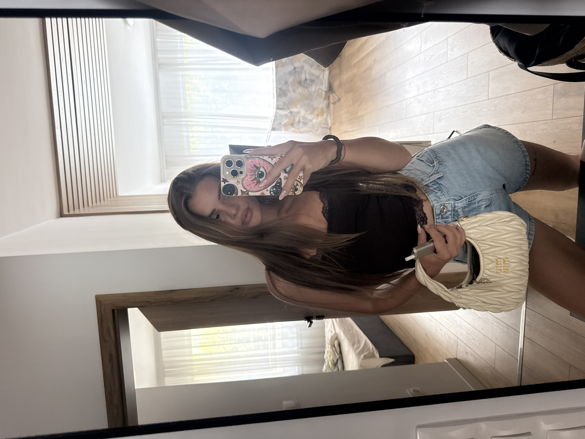 Mirror selfie moment in a Plovdiv bedroom, July 2026