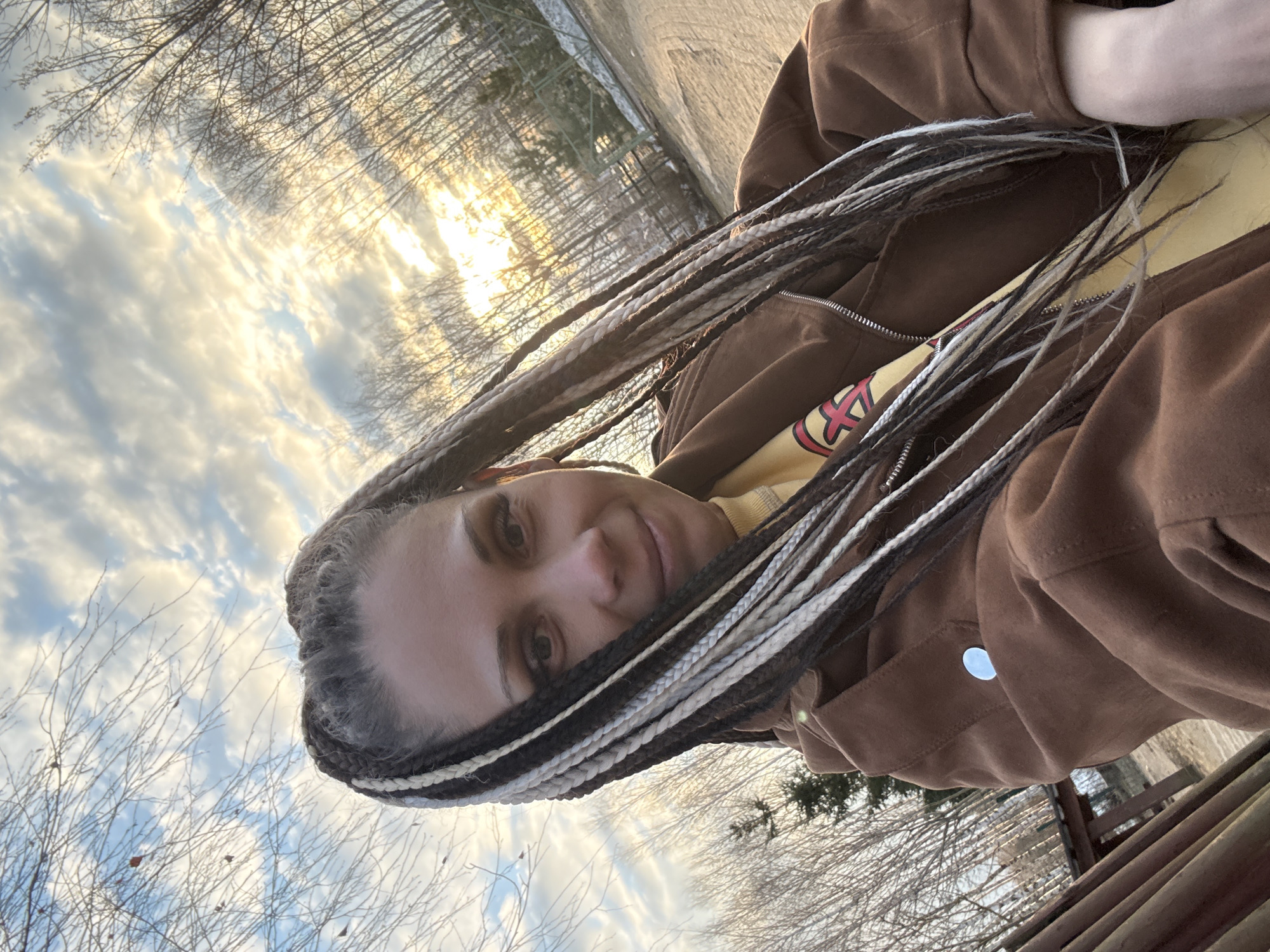Outdoor moments captured in Rusanovo: woman's selfie, girl watching animals