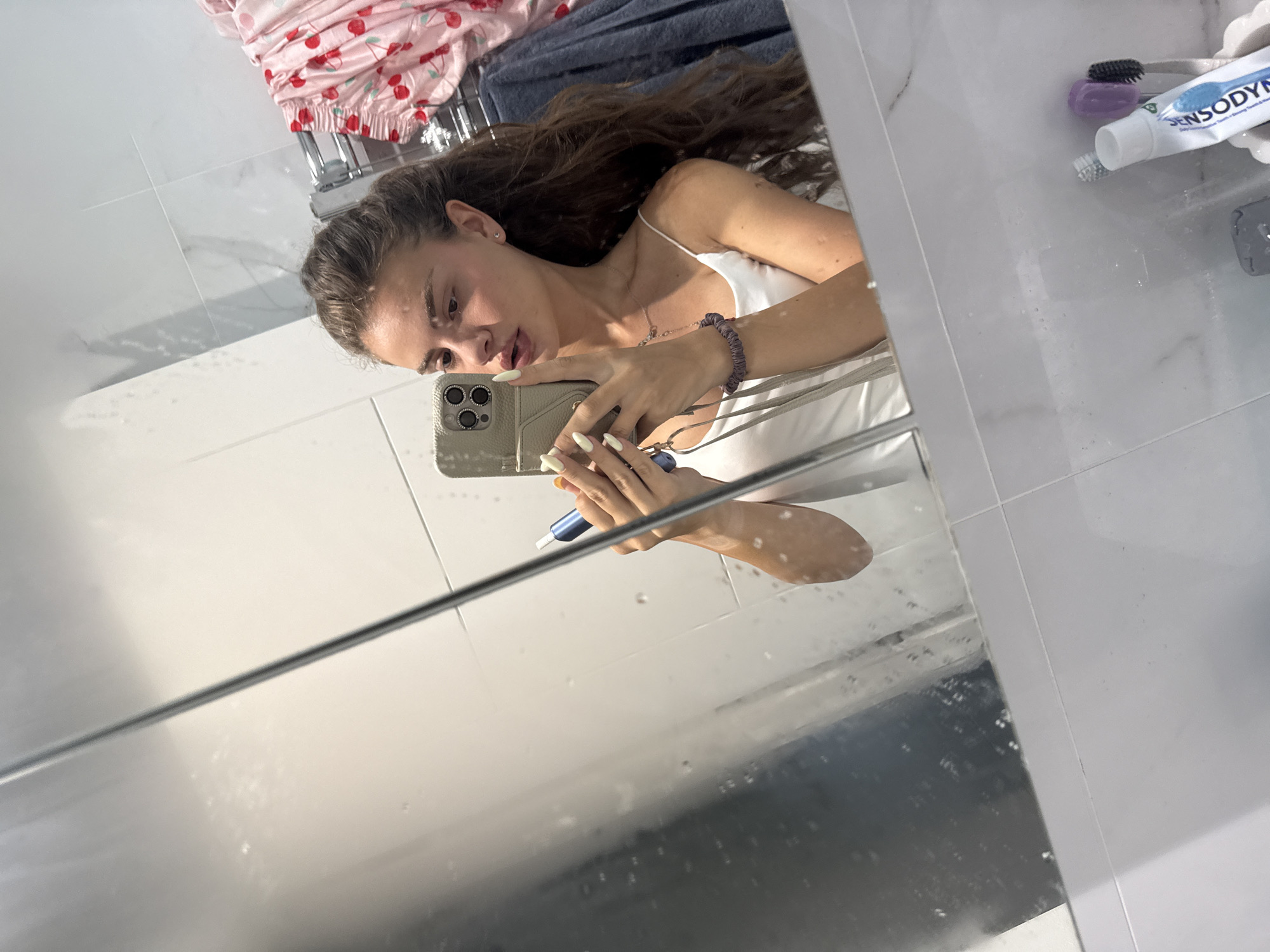Bathroom mirror selfies in Throop with a vape in hand