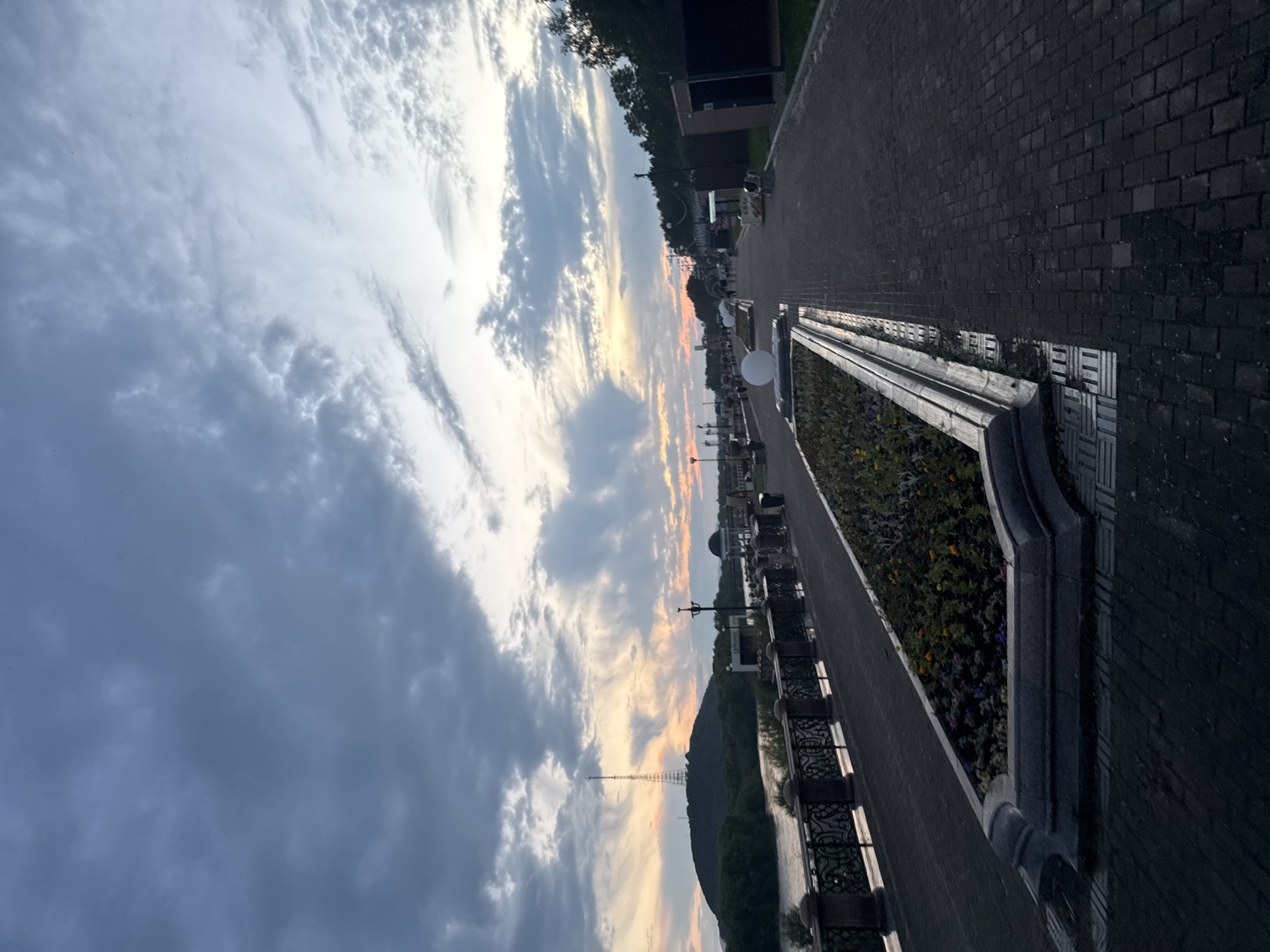 Birobidzhan's riverfront promenade at midsummer dusk