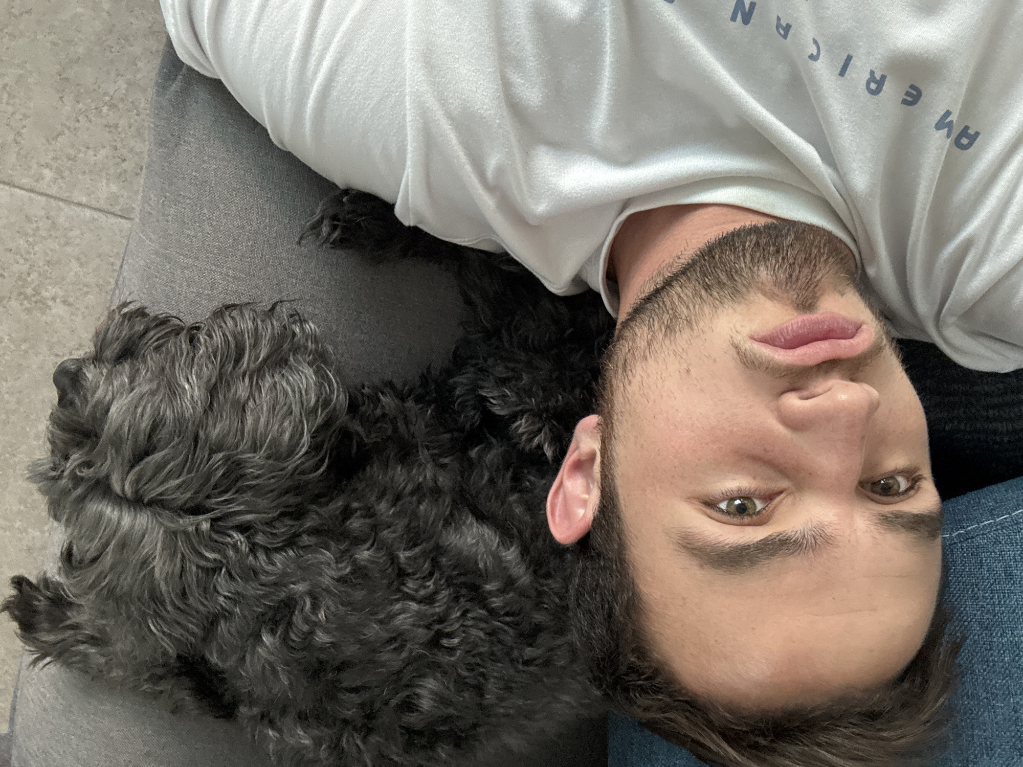 Man and chihuahua rest together in Mexican home