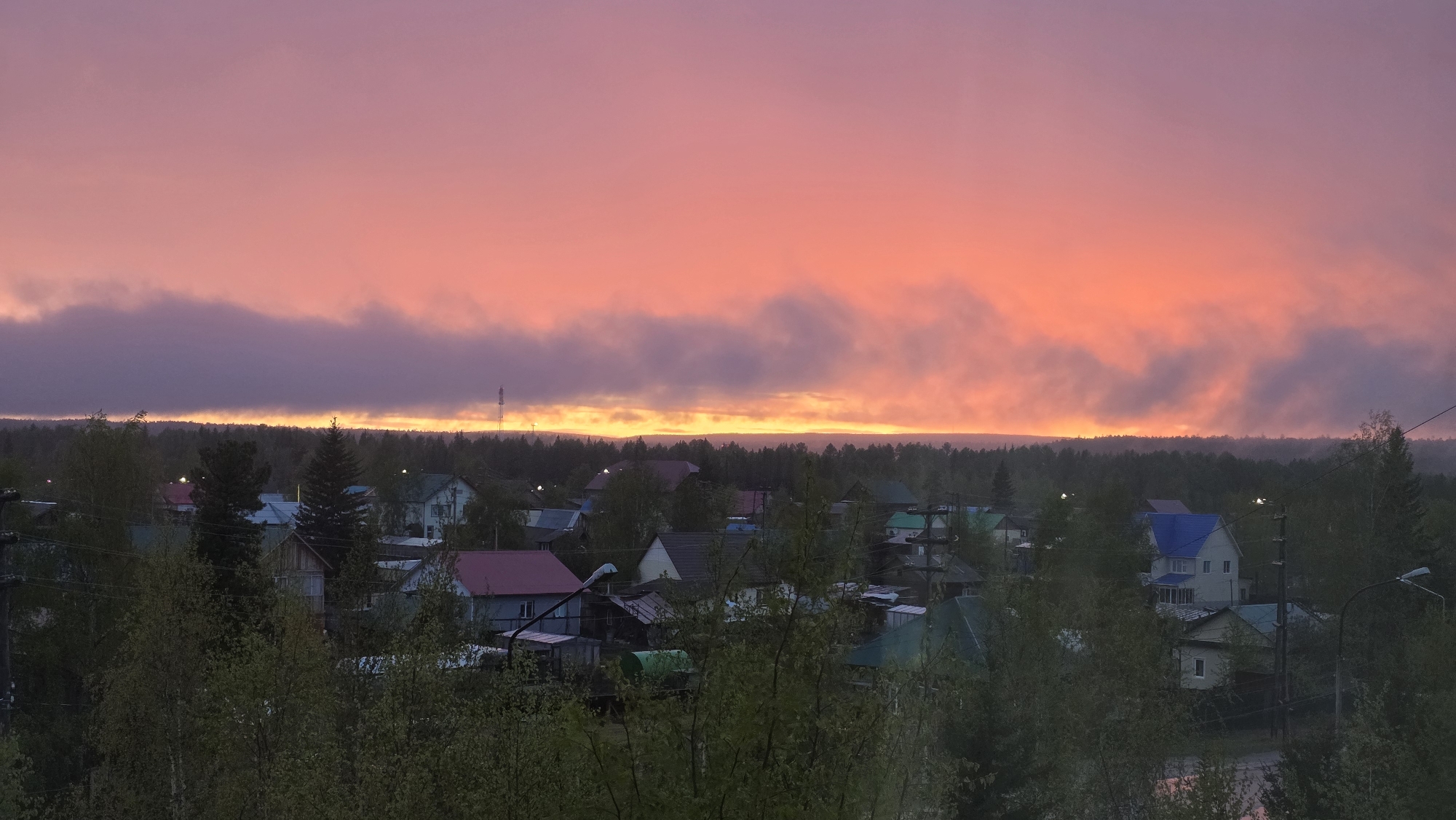 Dawn panorama captured over fog-shrouded Lensk, Russia
