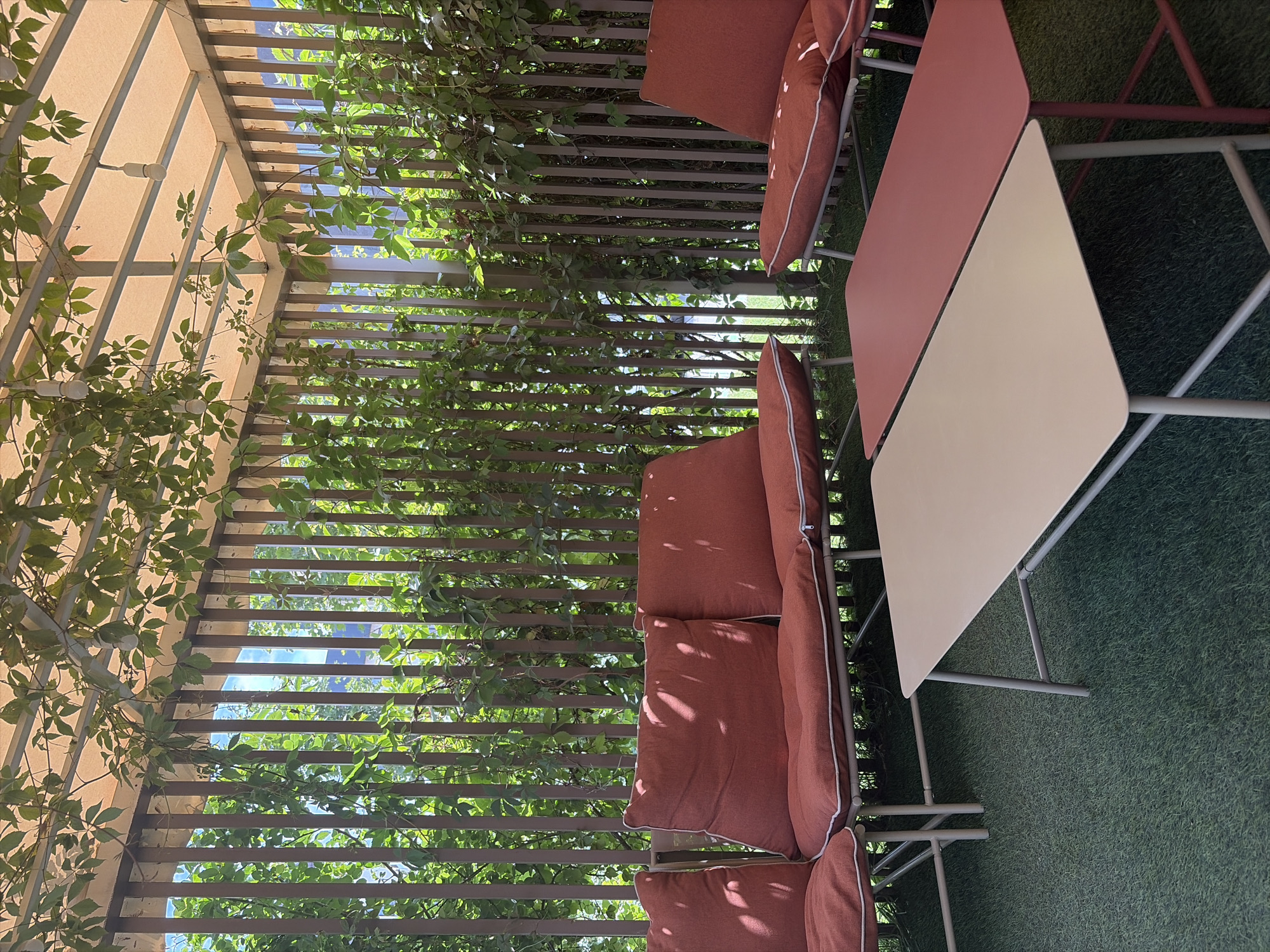 A quiet Bishkek morning across streets, patios, and apartment blocks