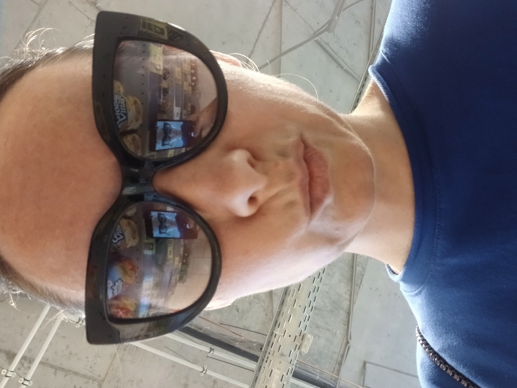 A day out in Yekaterinburg, seen through black cat-eye sunglasses.