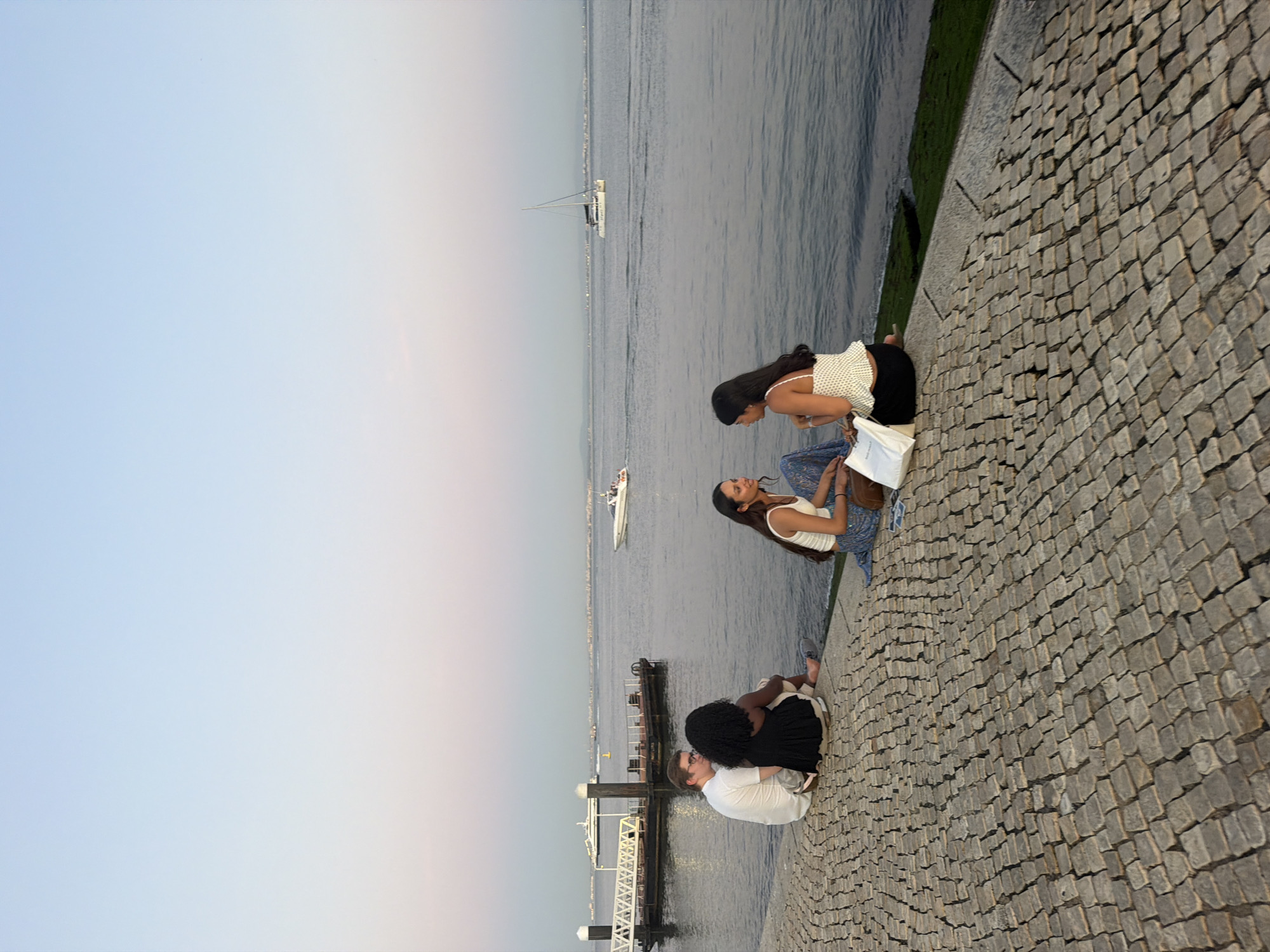 Lisbon's Tagus waterfront at dusk, markets and river views
