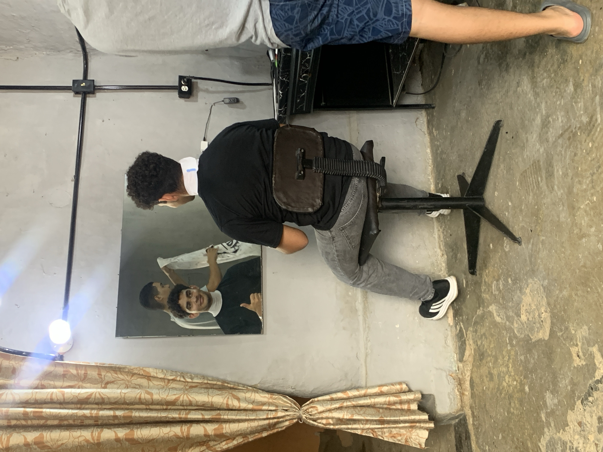 Barbershop haircut documented in La Tagua, Venezuela evening session